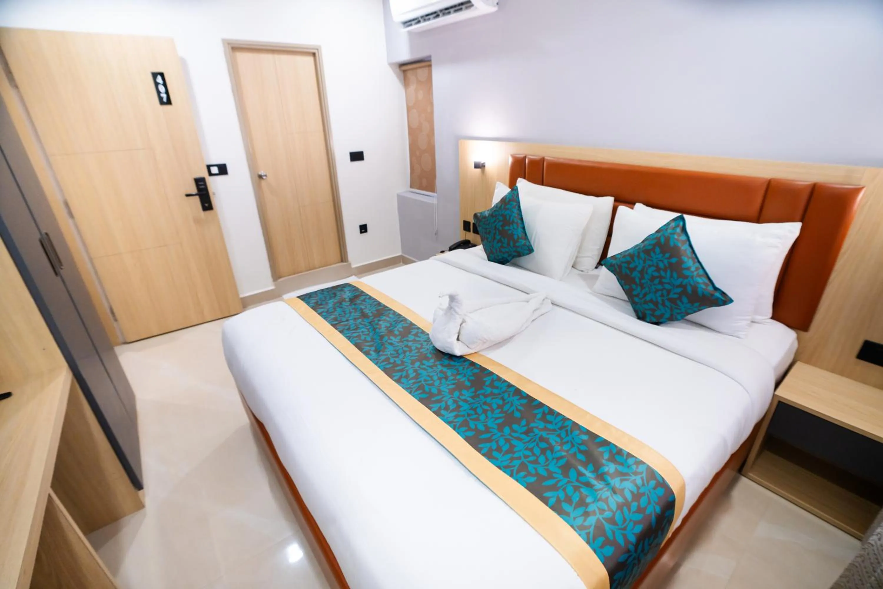 Bedroom, Bed in Sunrise Business Hotel, S R Nagar - Ameerpet