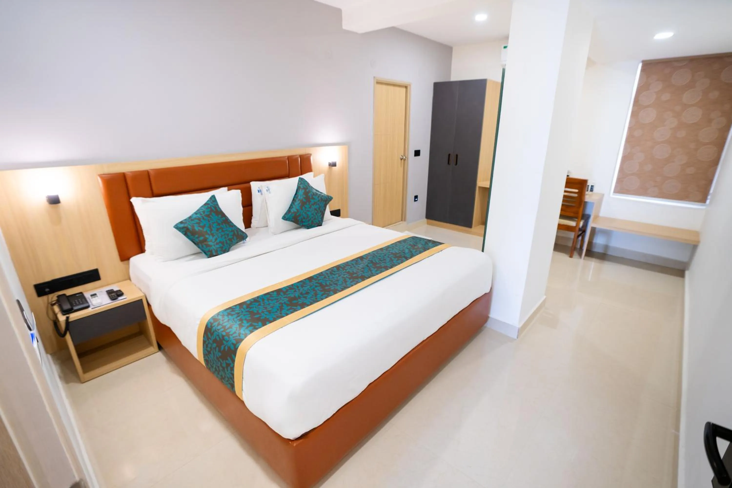 Photo of the whole room, Bed in Sunrise Business Hotel, S R Nagar - Ameerpet