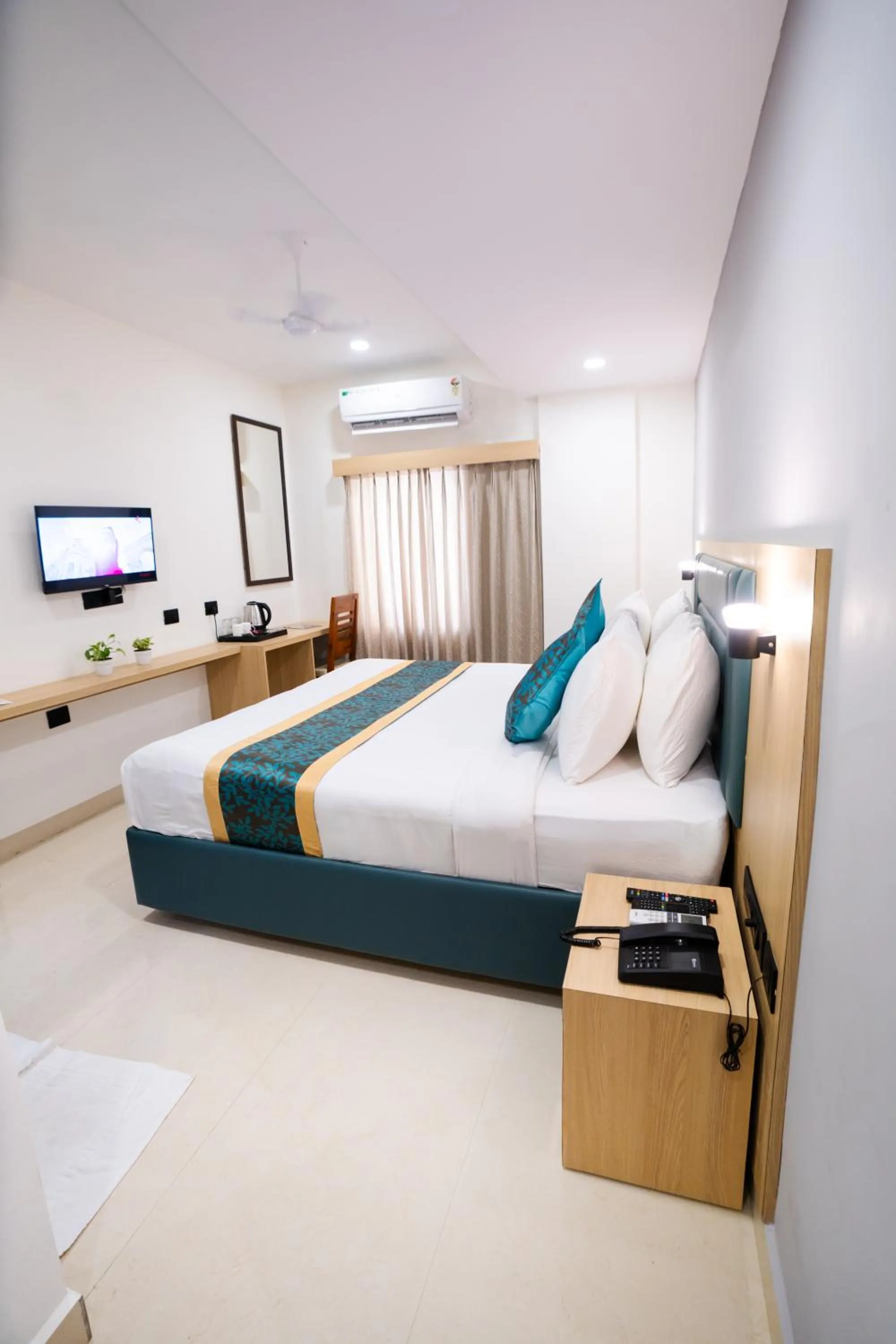 Photo of the whole room, Bed in Sunrise Business Hotel, S R Nagar - Ameerpet