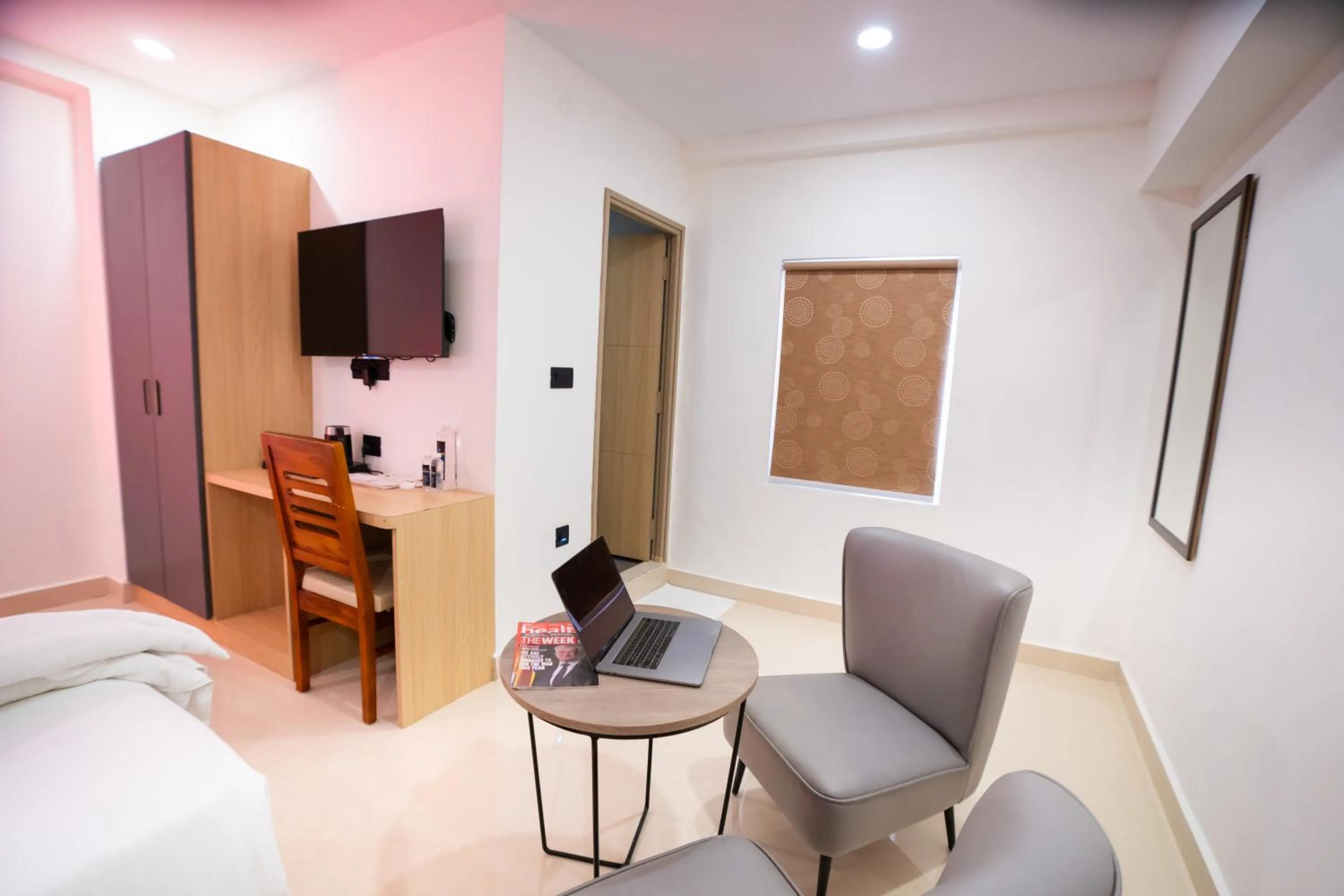 Seating area, Bed in Sunrise Business Hotel, S R Nagar - Ameerpet