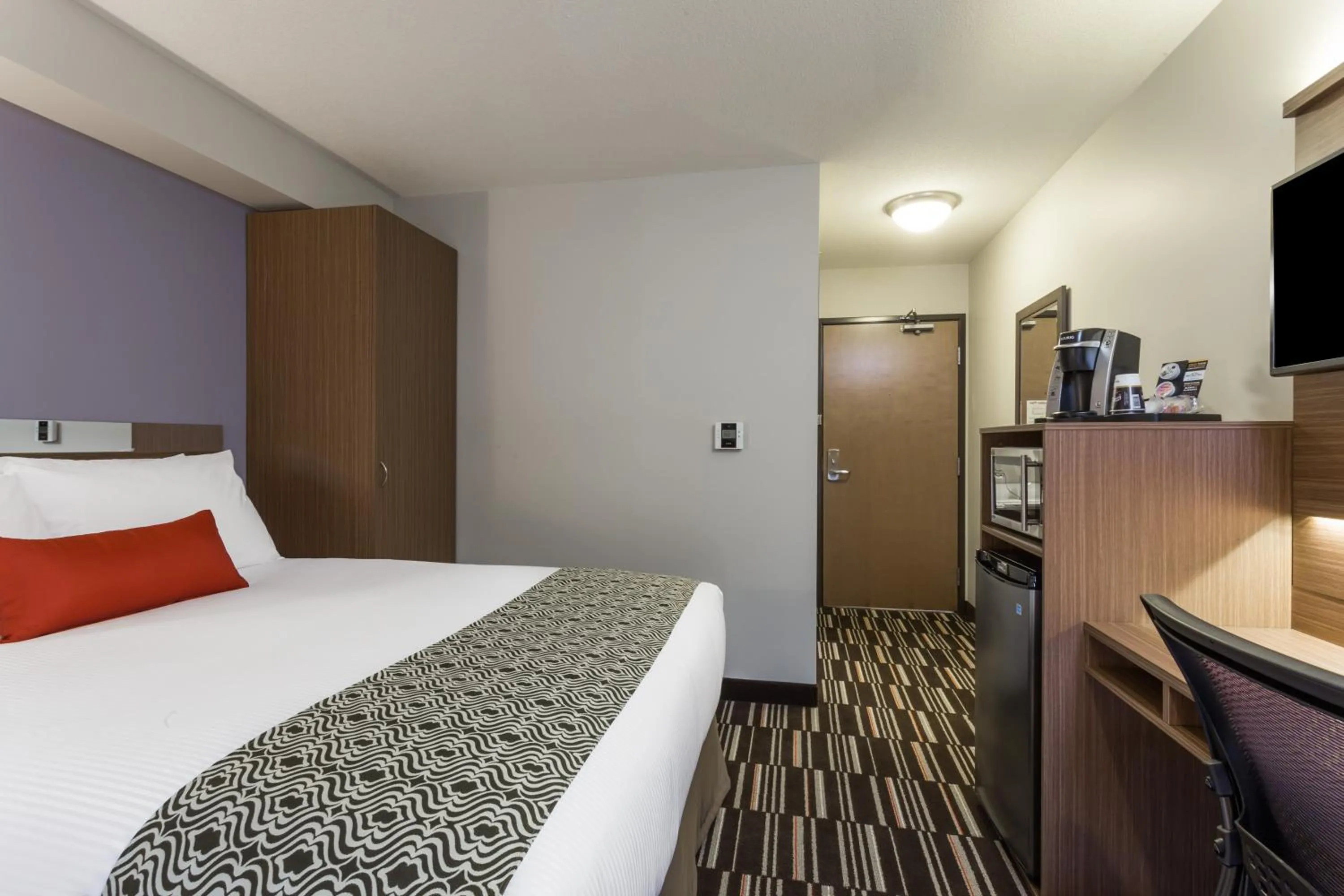 Bedroom, Bed in Microtel Inn & Suites by Wyndham Fort Saint John