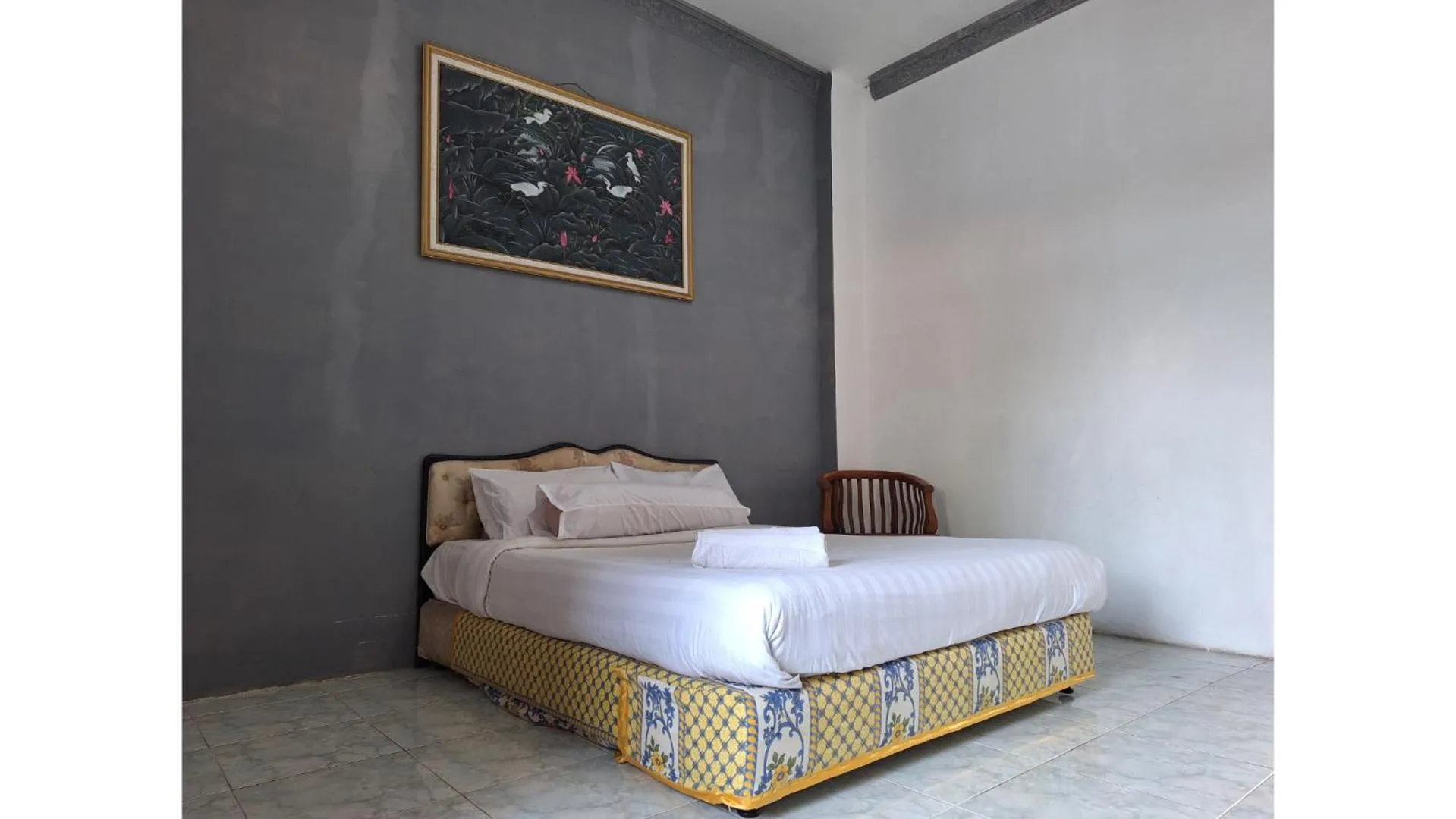 Bed in PLUM Hotel Palereman Batu