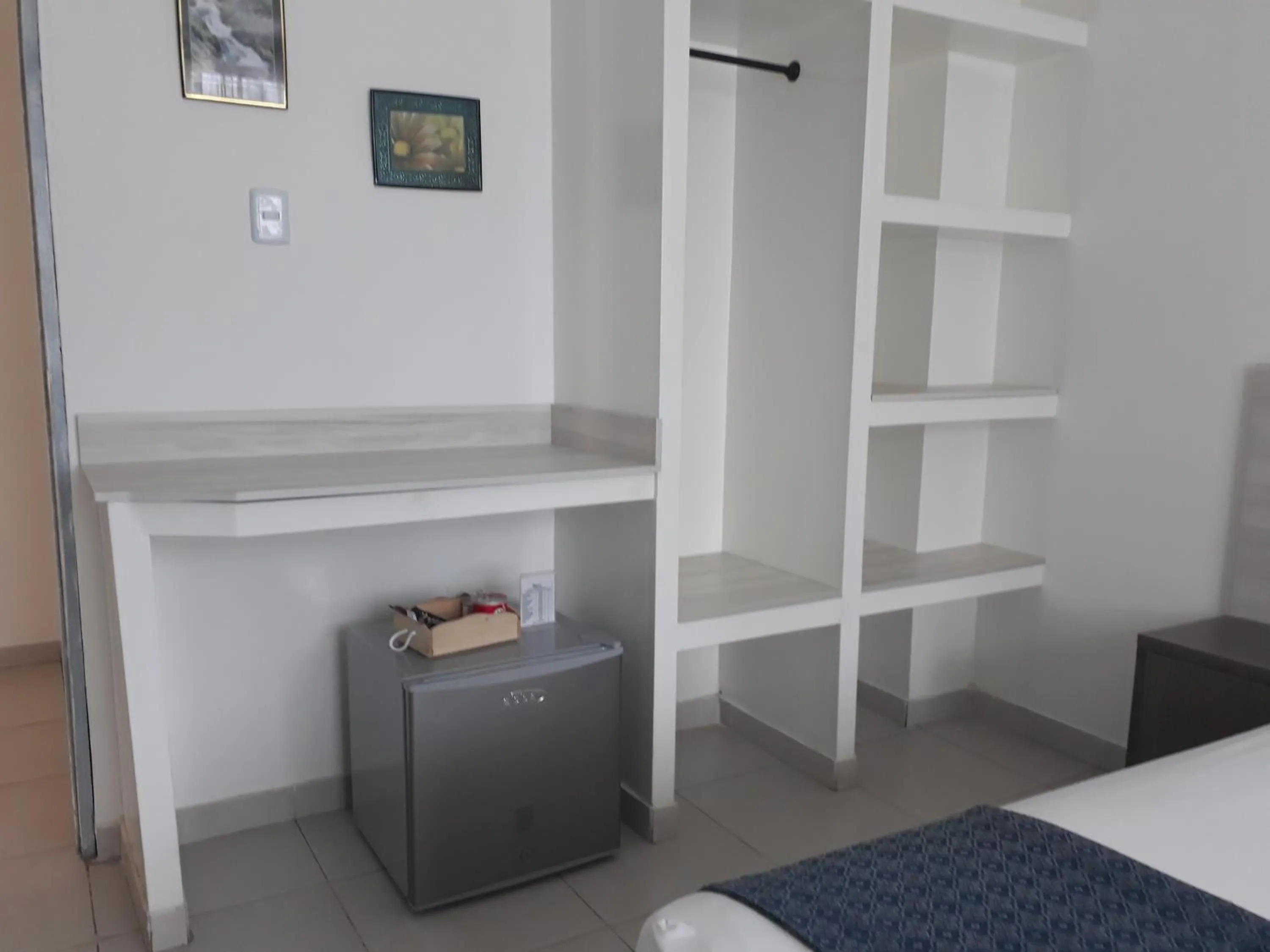 minibar, Bed in Mintaka Hotel + Lounge