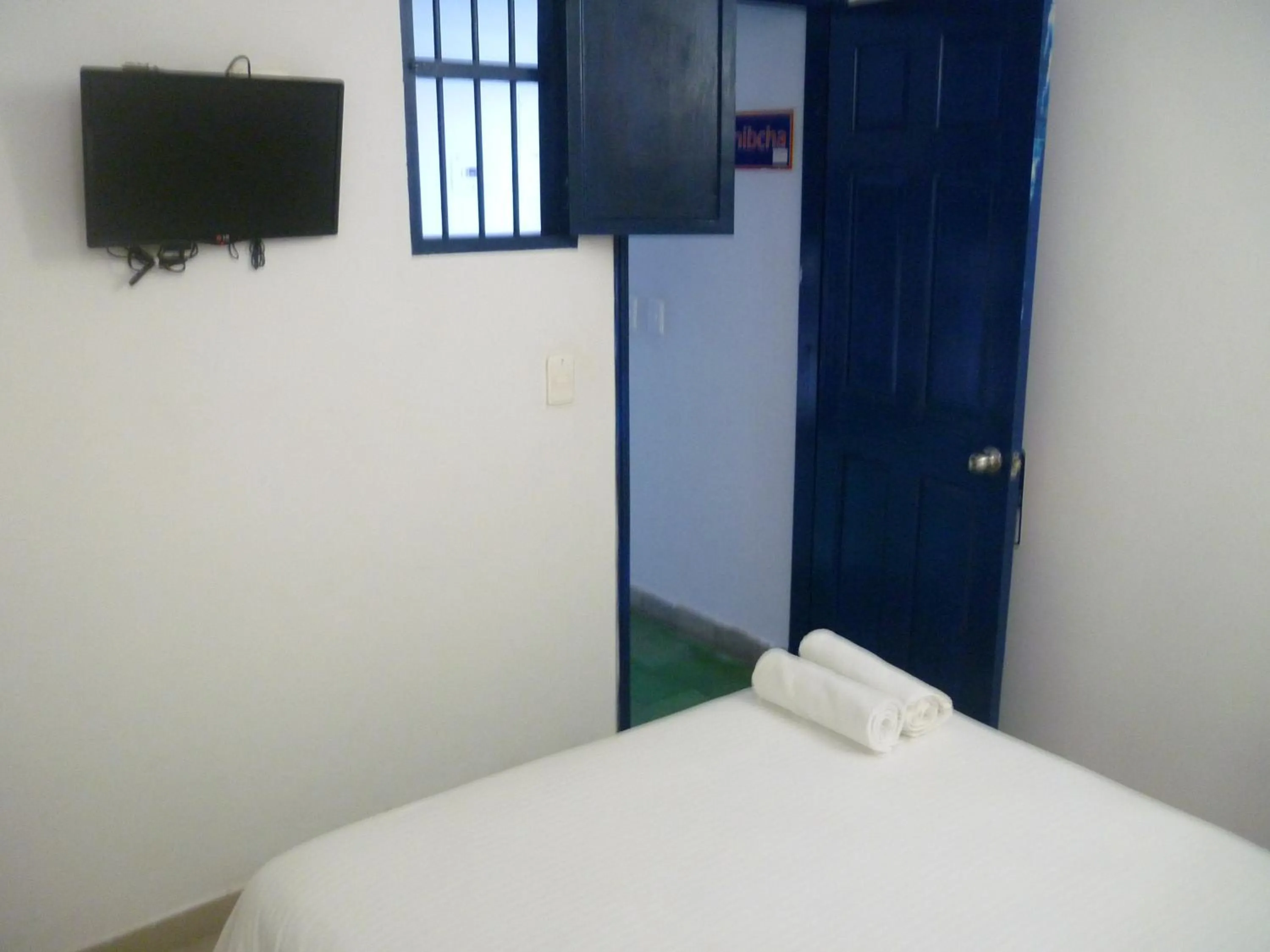 Communal lounge/ TV room, Bed in Zana Hotel Boutique