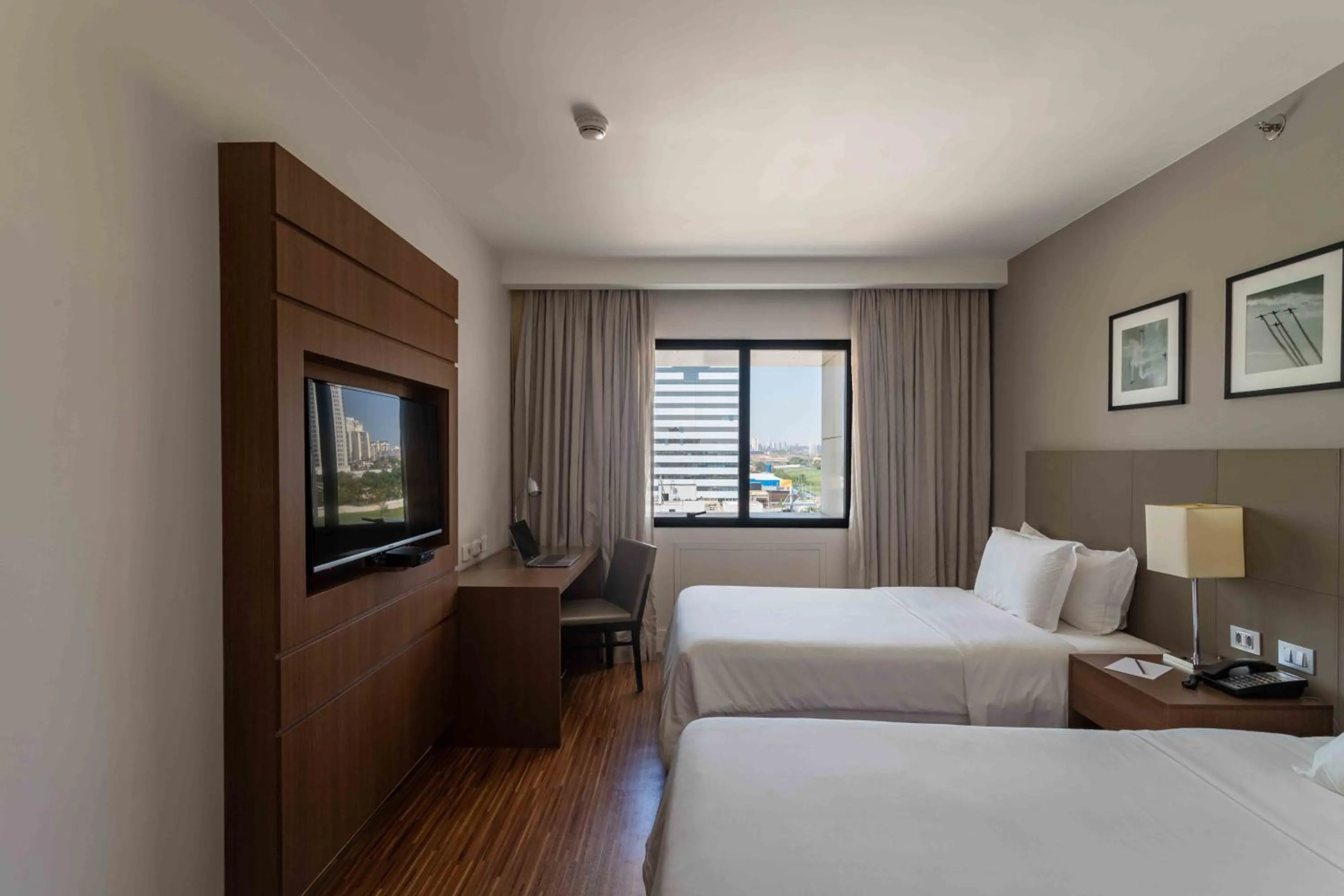 Bed in Golden Tulip São José dos Campos