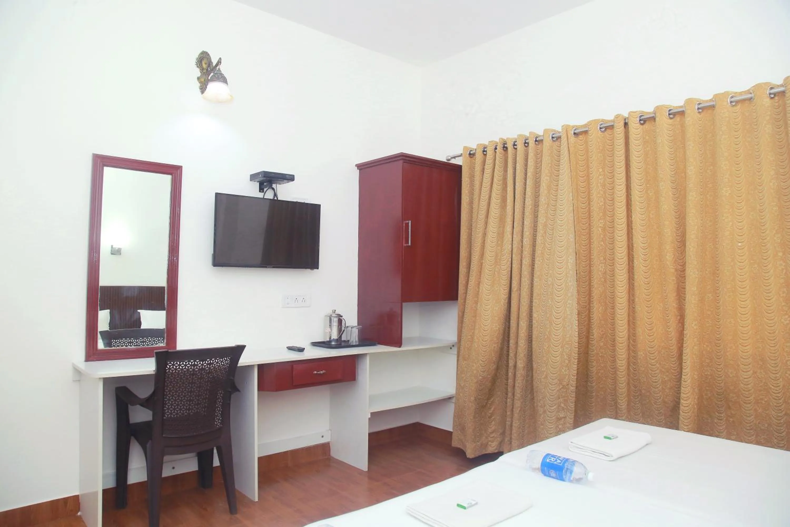 Bed in Hotel Srinivas