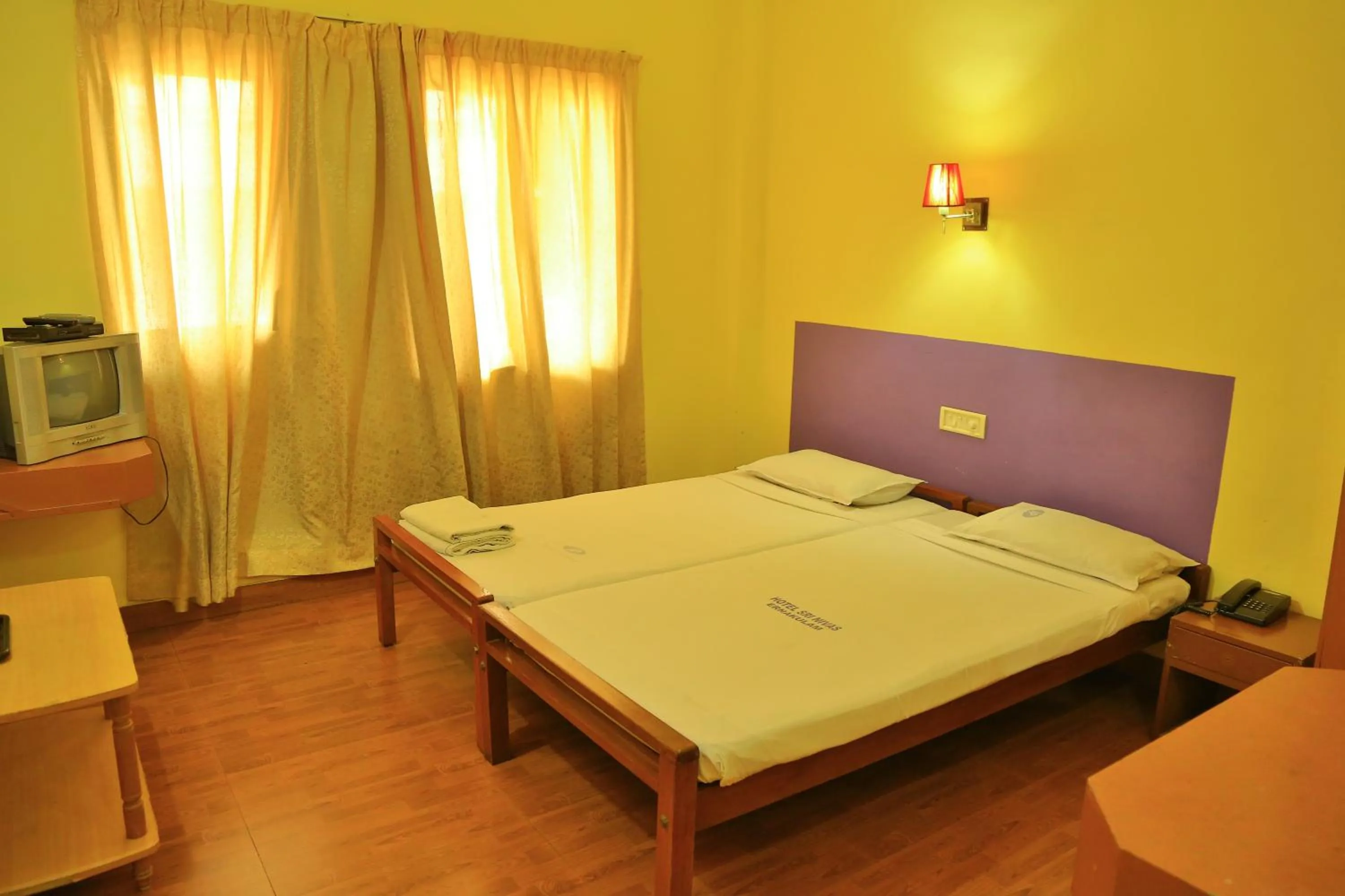 Bedroom, Bed in Hotel Srinivas