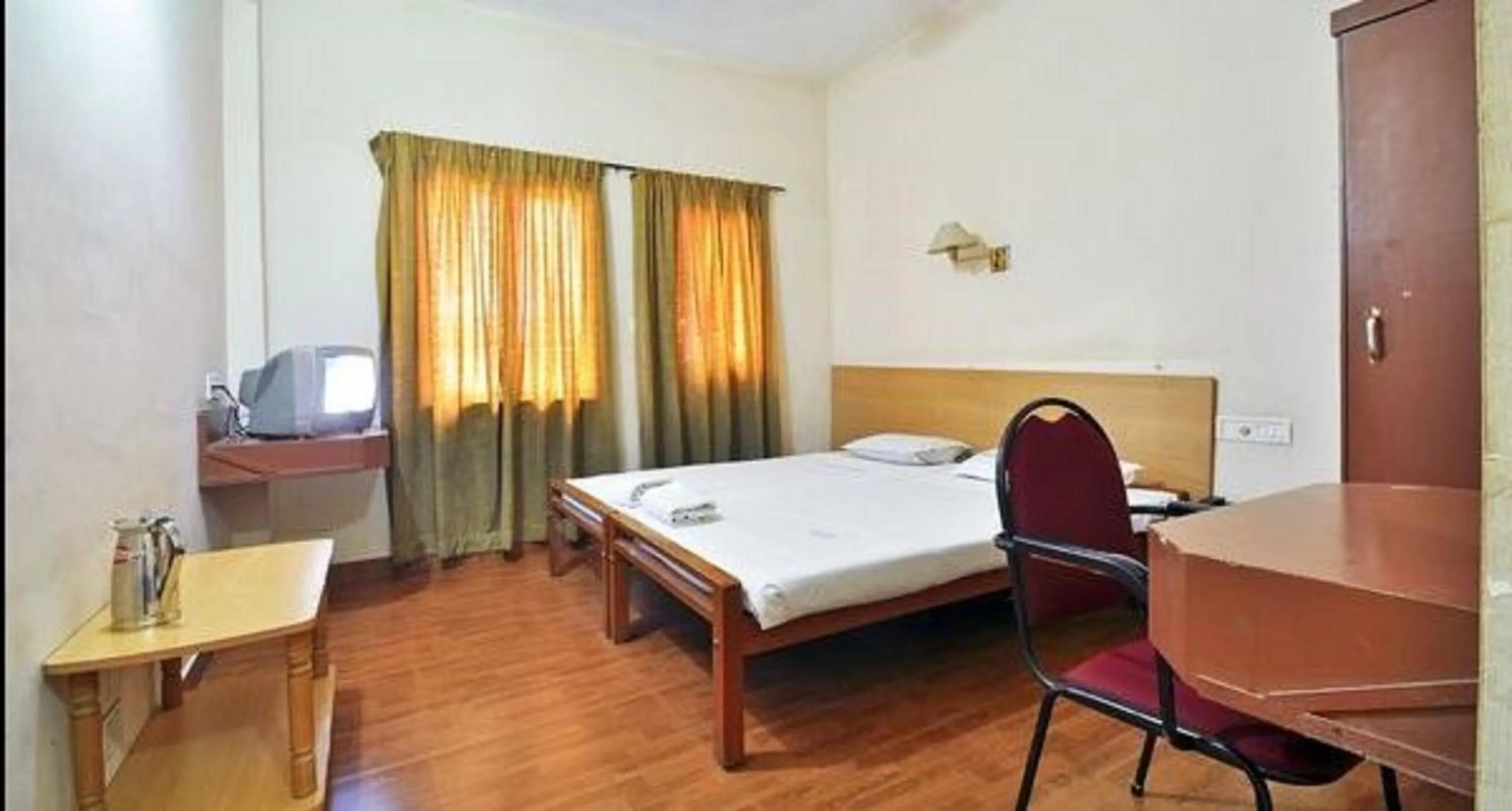 Photo of the whole room, Bed in Hotel Srinivas