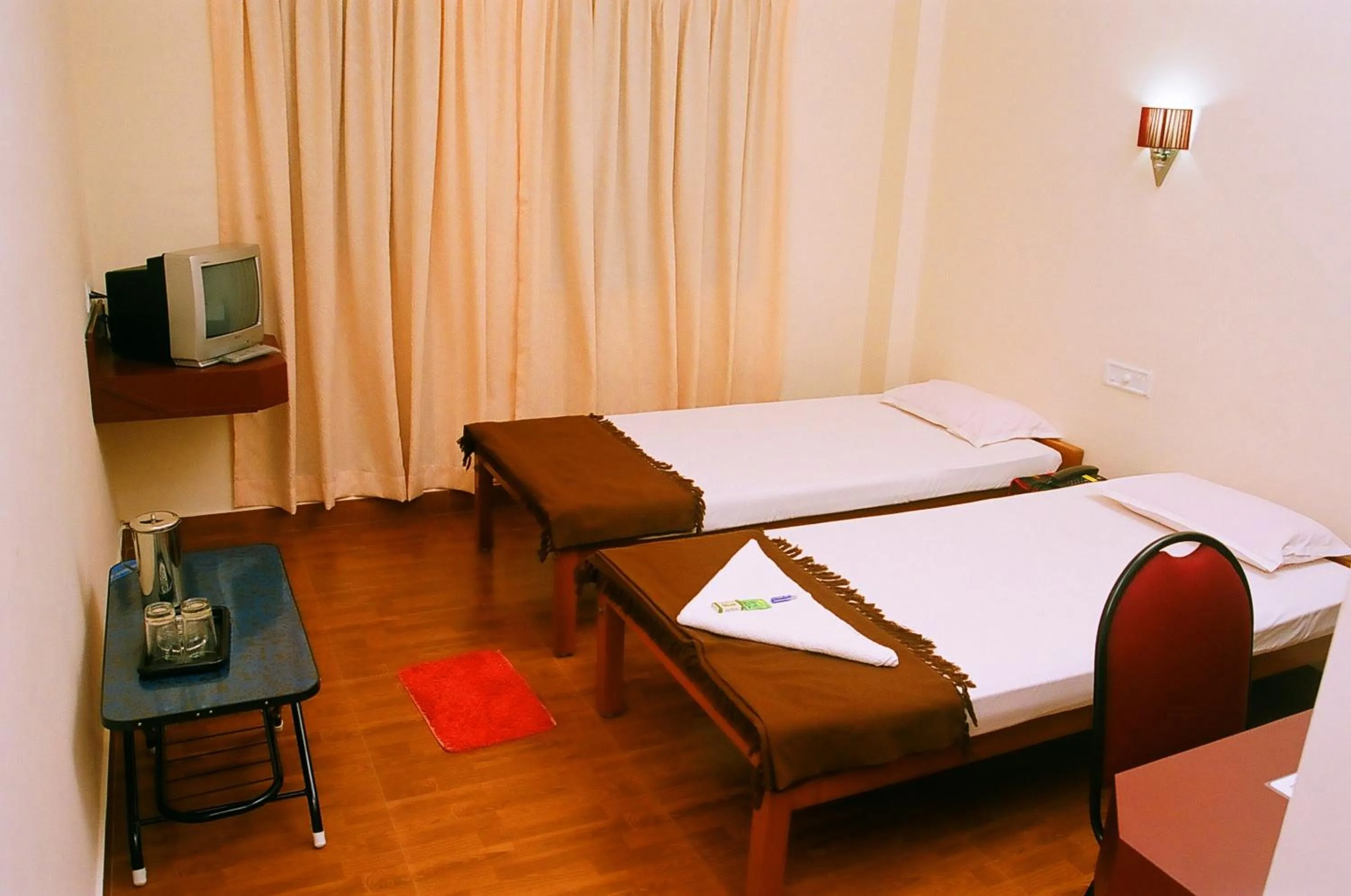 TV and multimedia, Bed in Hotel Srinivas