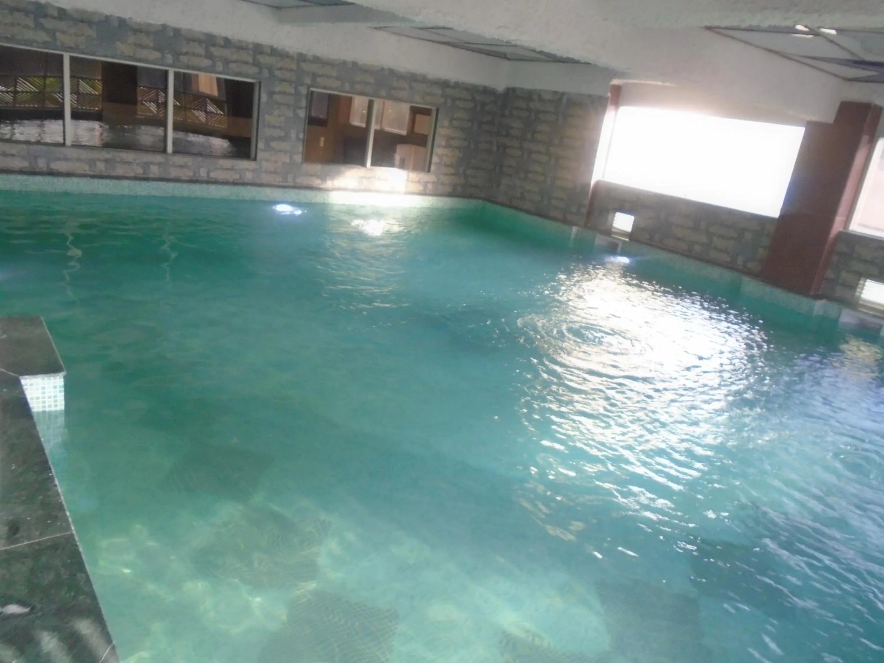Swimming pool in Days Hotel By Wyndham Neemrana