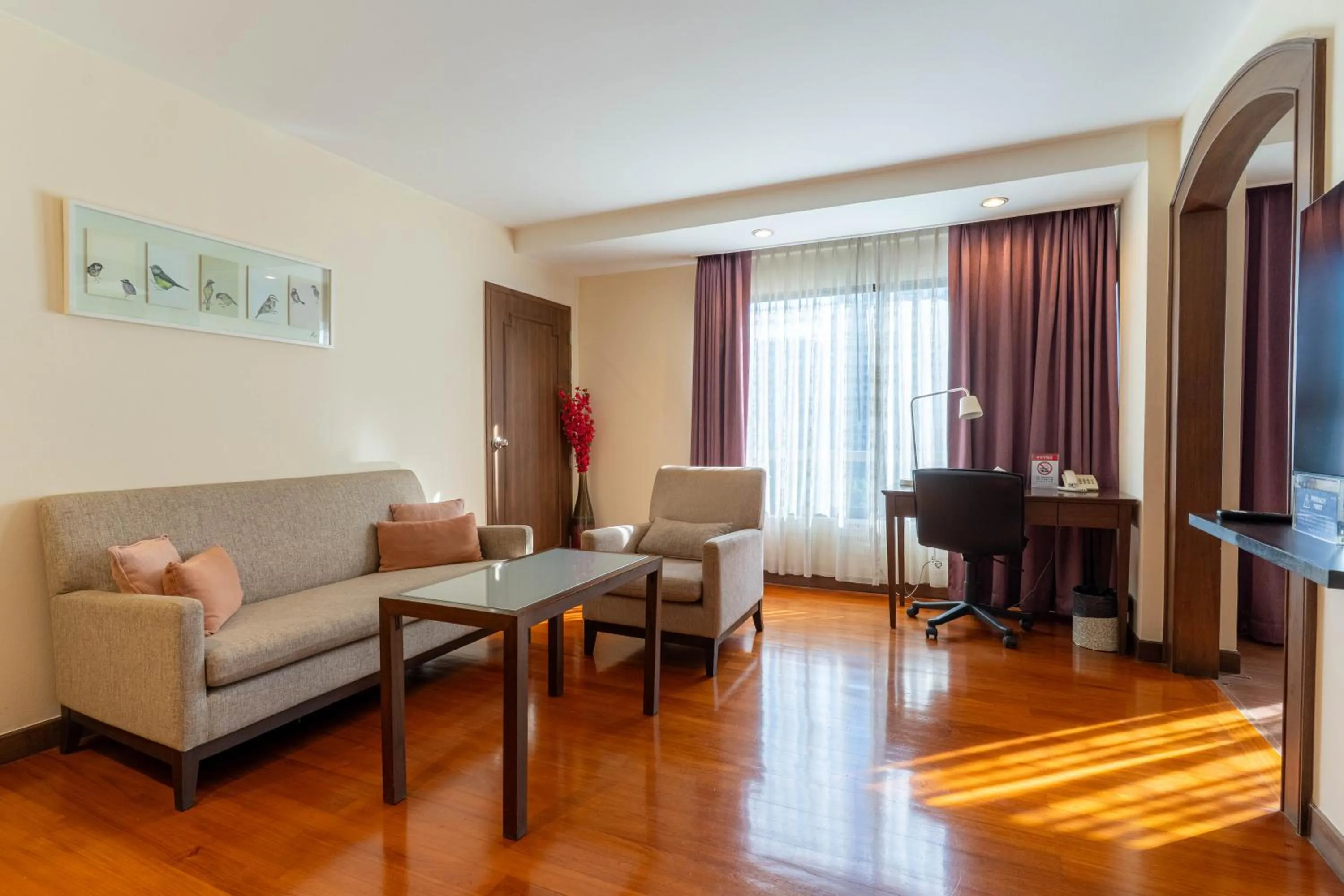 Living room in Journeyhub Sukhumvit 26, Bangkok - Formerly St James Hotel