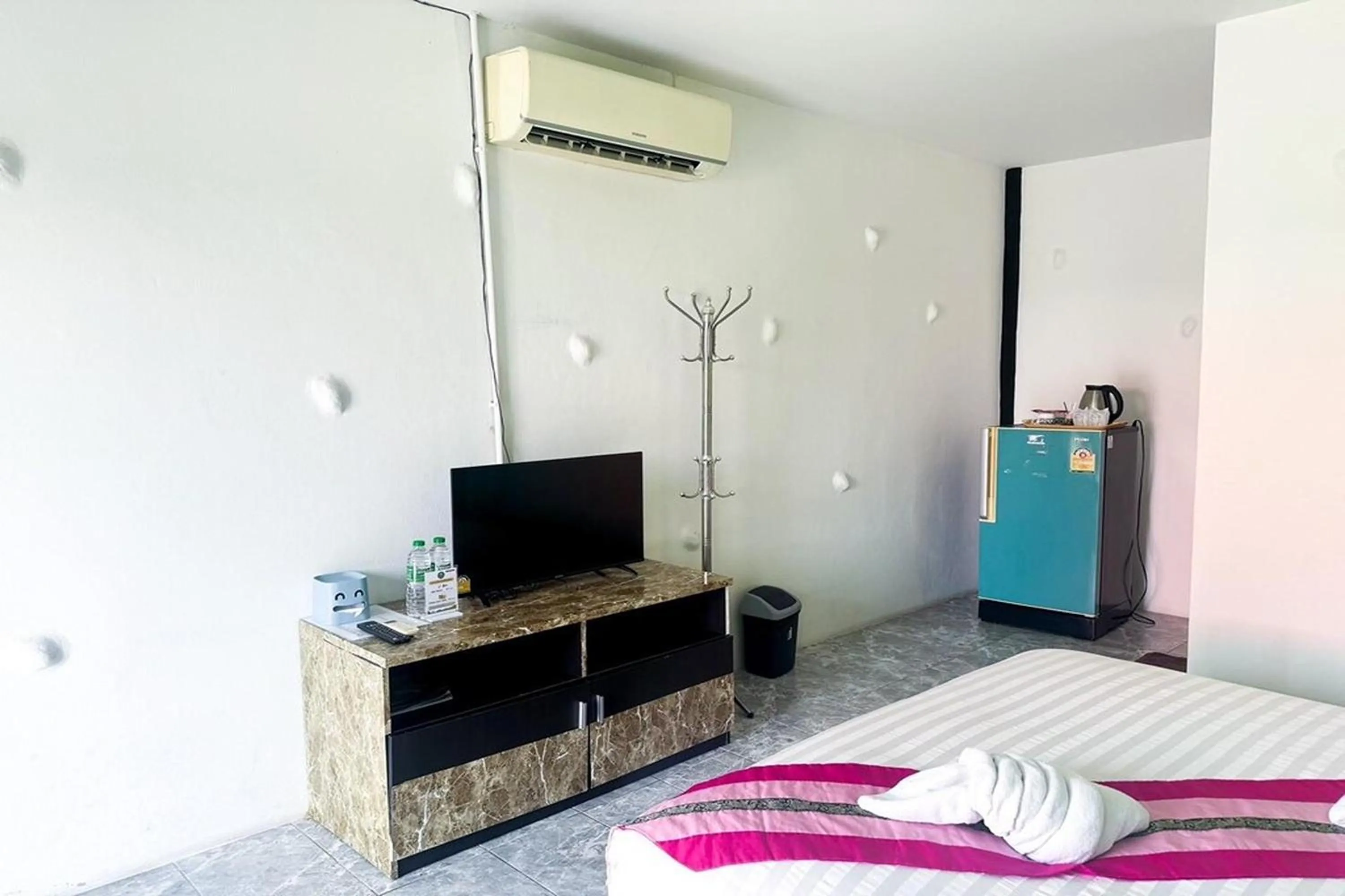 Bed in Pai Tawan Resort Hotel - Pet friendly