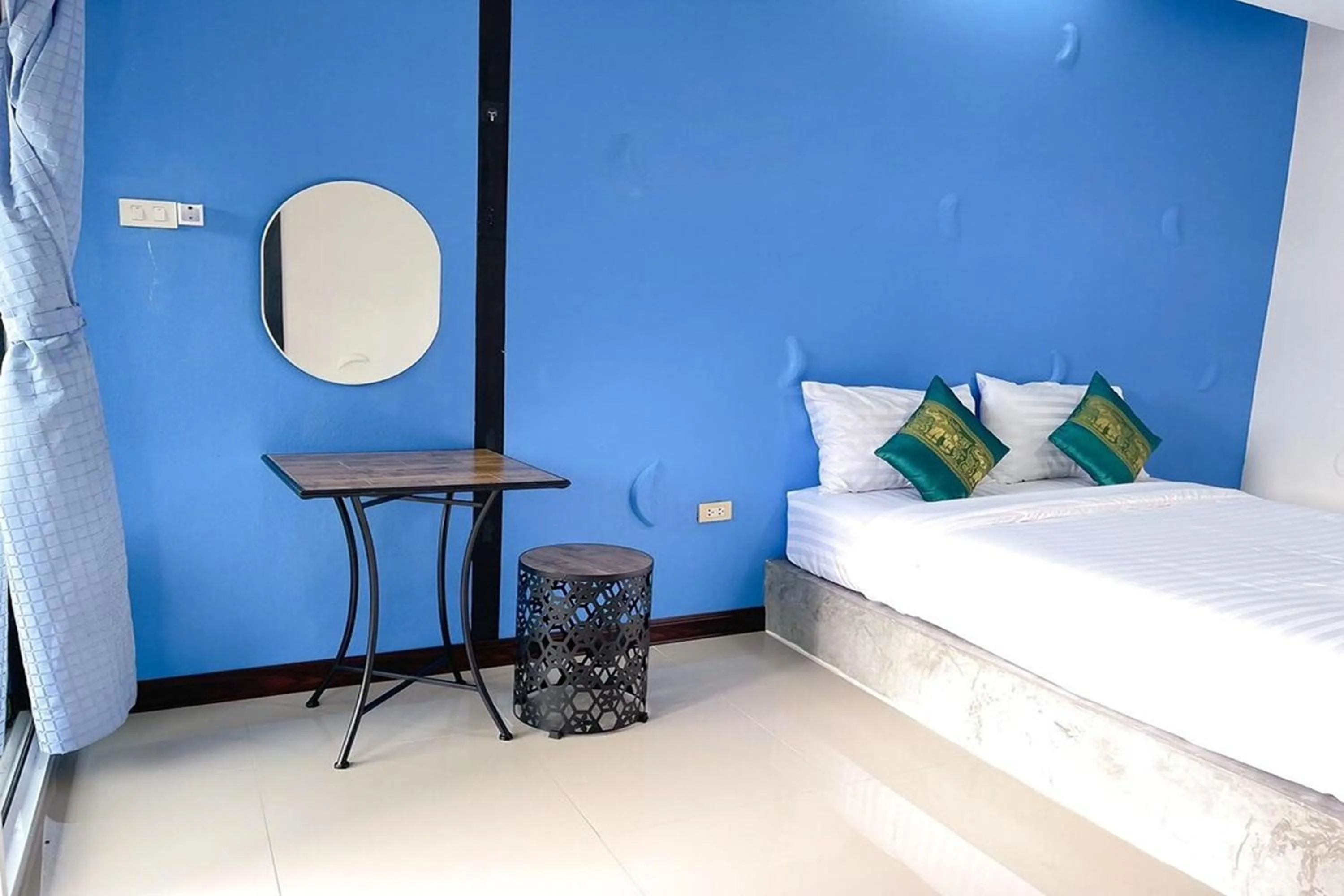 Bed in Pai Tawan Resort Hotel - Pet friendly