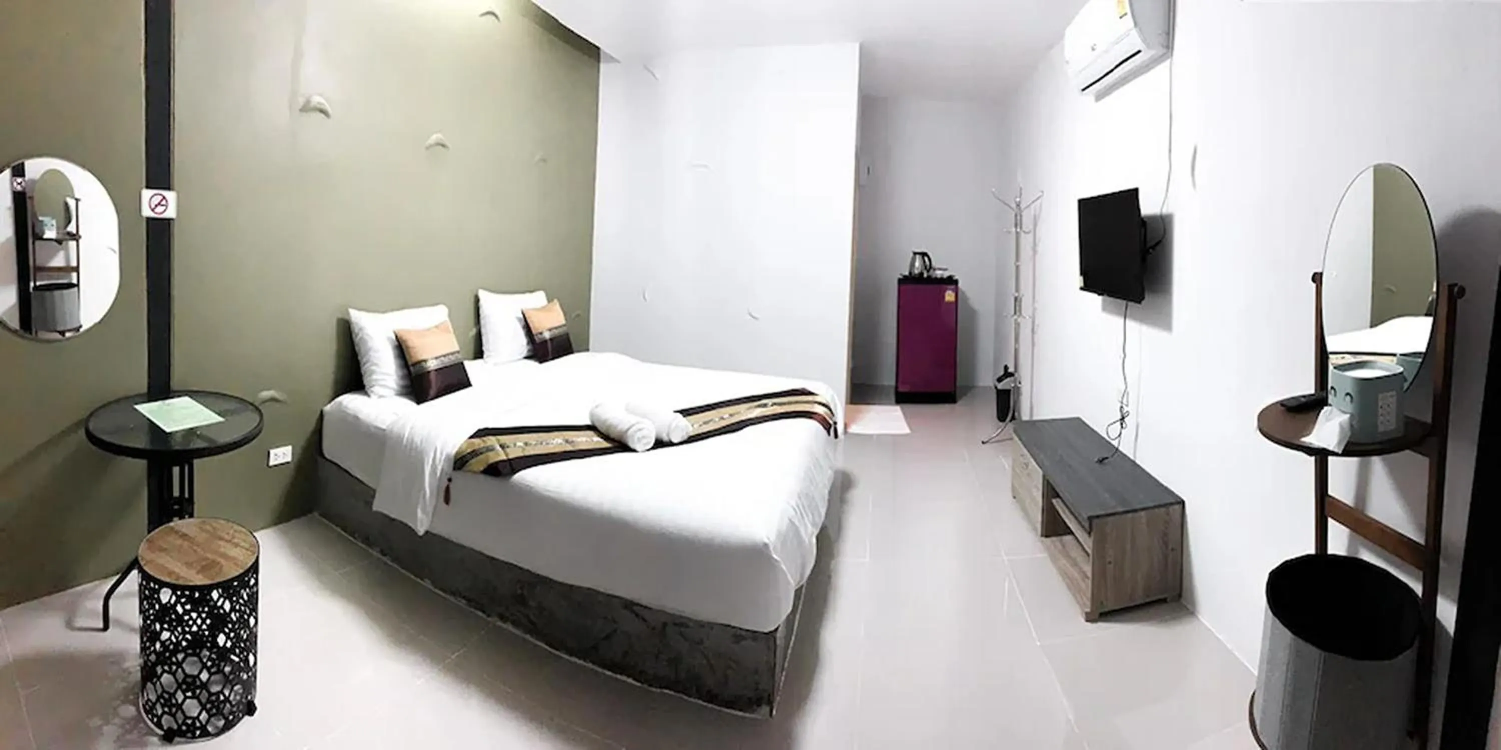 Bed in Pai Tawan Resort Hotel - Pet friendly