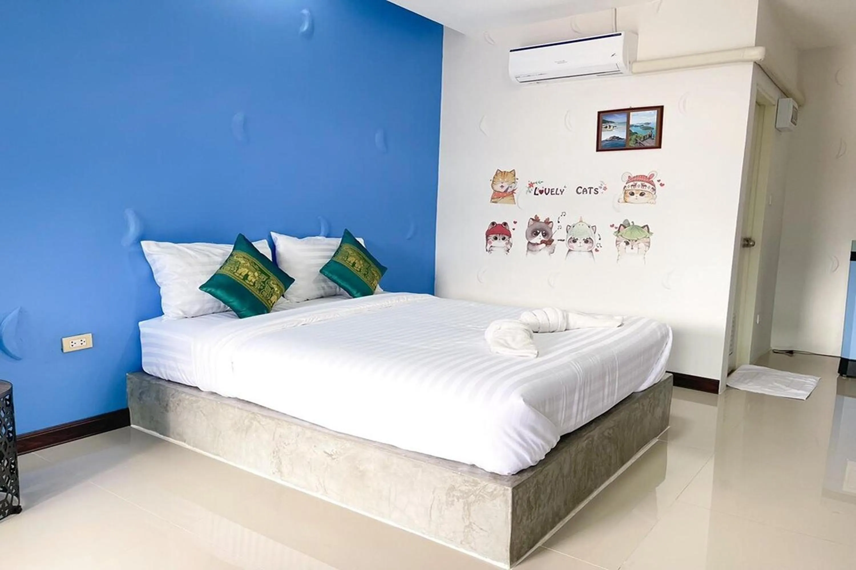 Bed in Pai Tawan Resort Hotel - Pet friendly