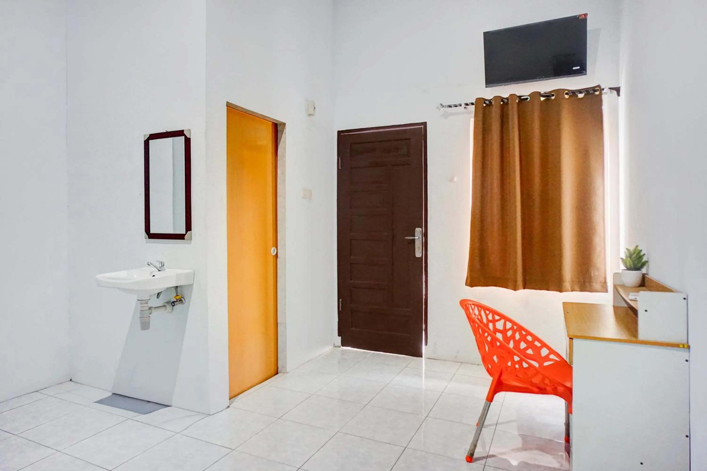 TV and multimedia in Hotel O Medan Timur Near Rsu Madani