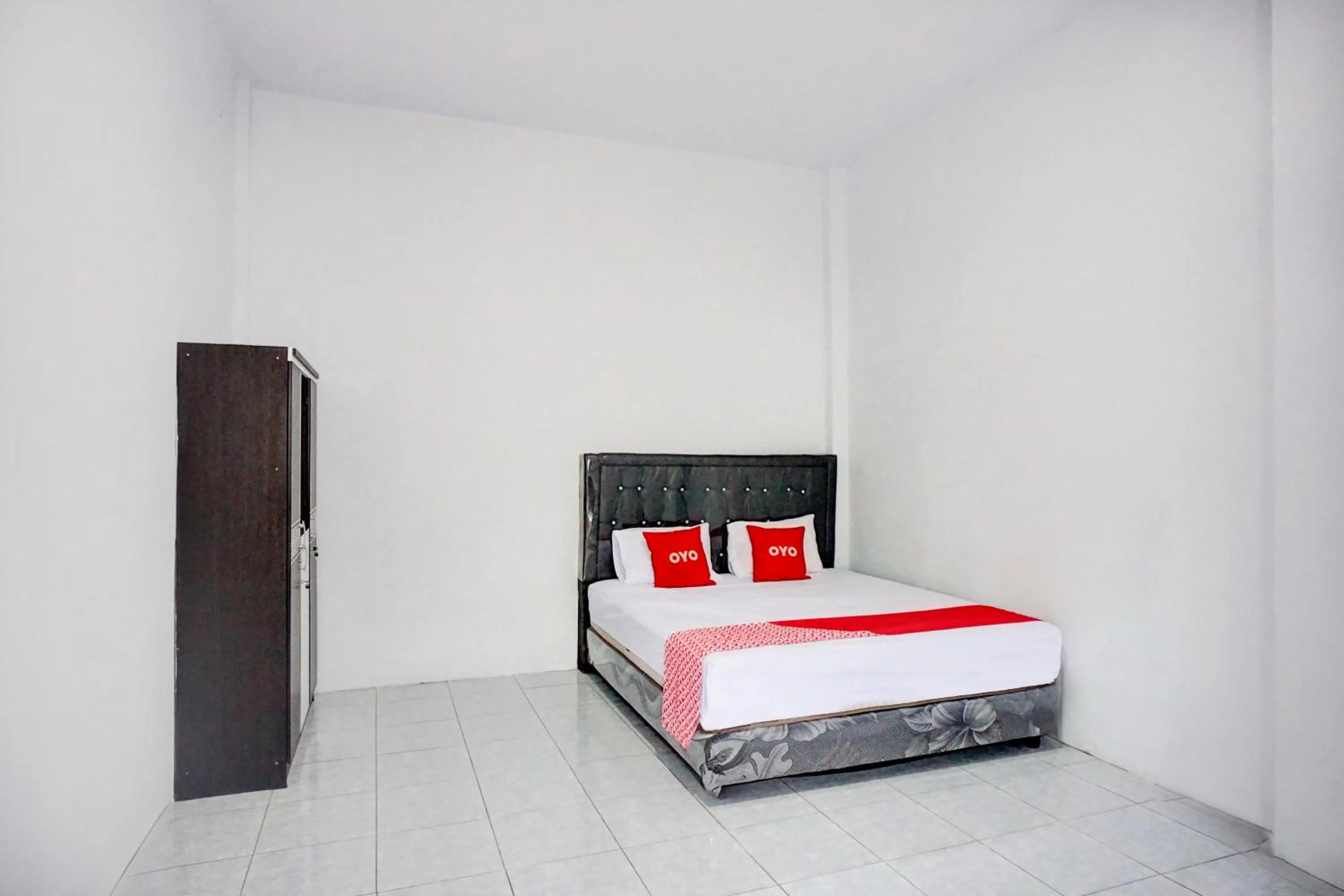 Bed in Hotel O Medan Timur Near Rsu Madani