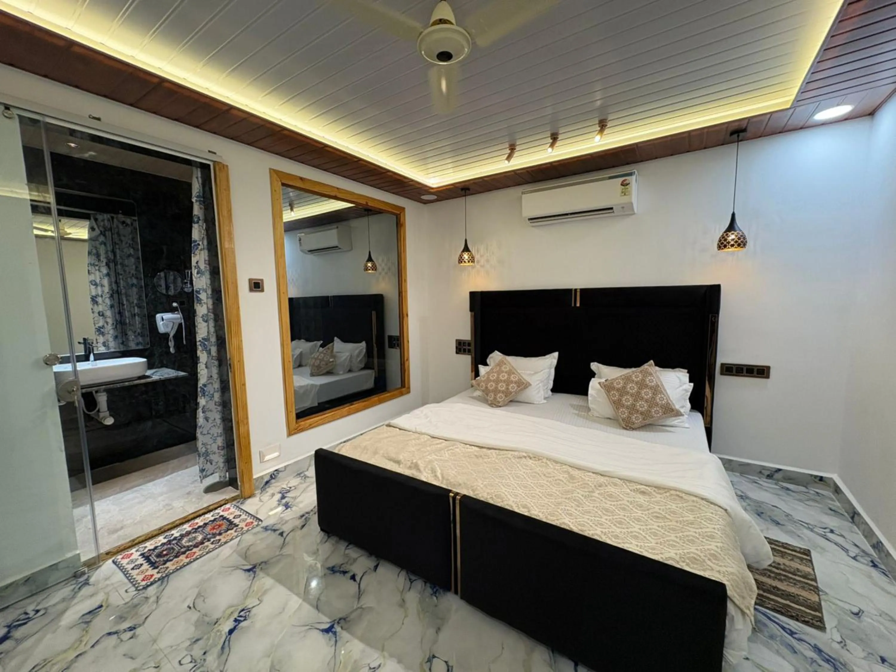 Photo of the whole room, Bed in The Charming Nights