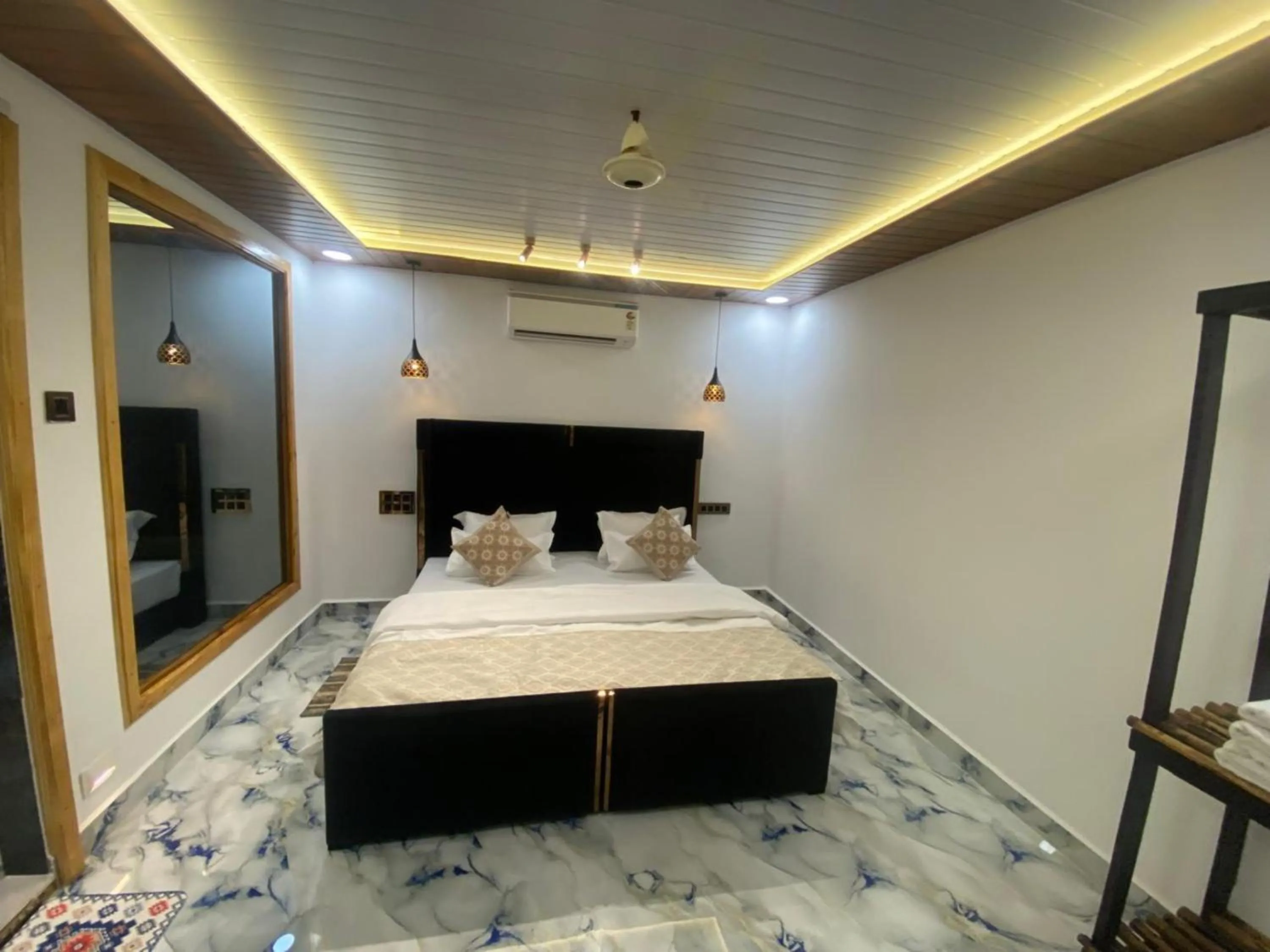 Photo of the whole room, Bed in The Charming Nights