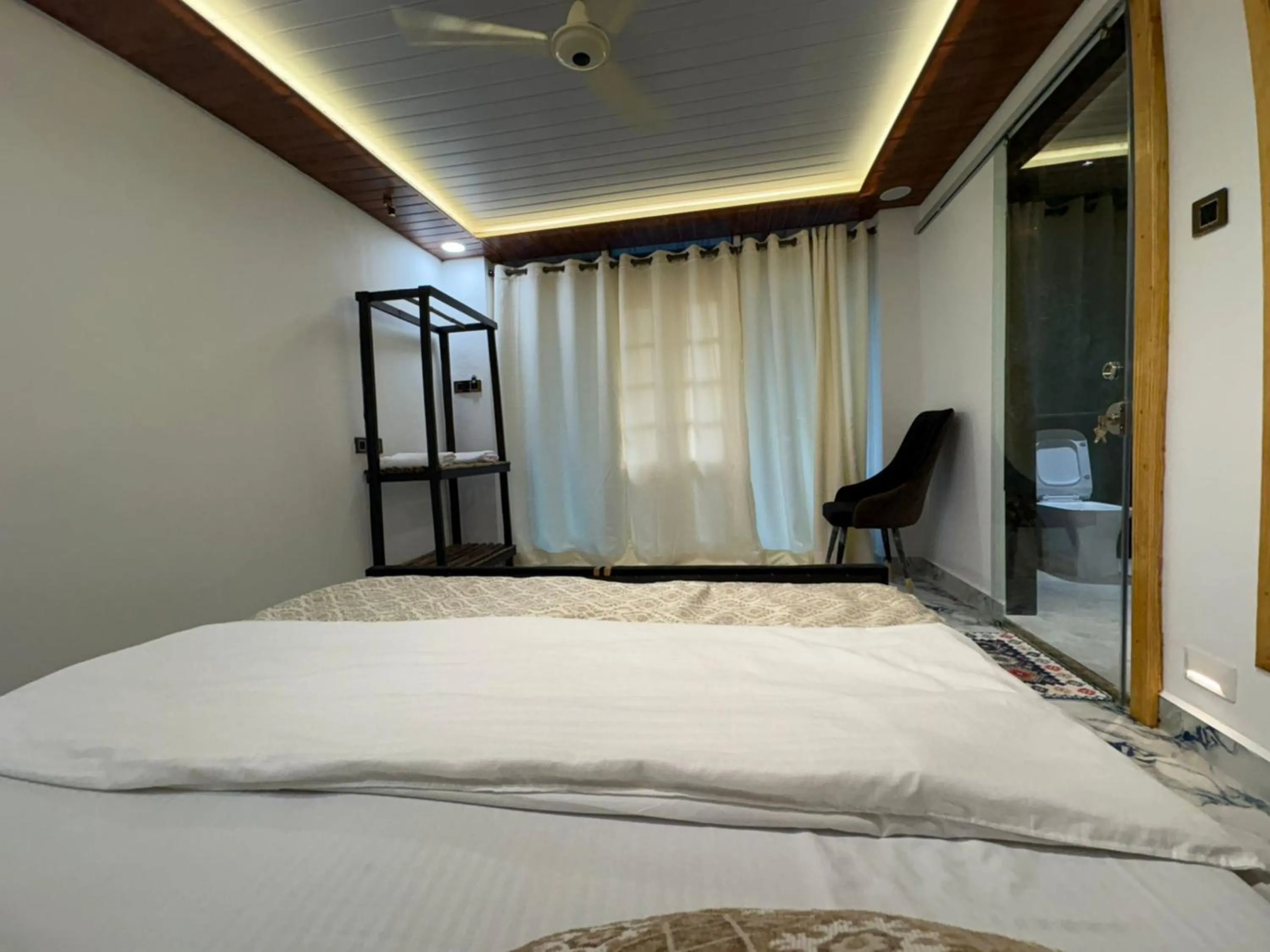 Photo of the whole room, Bed in The Charming Nights