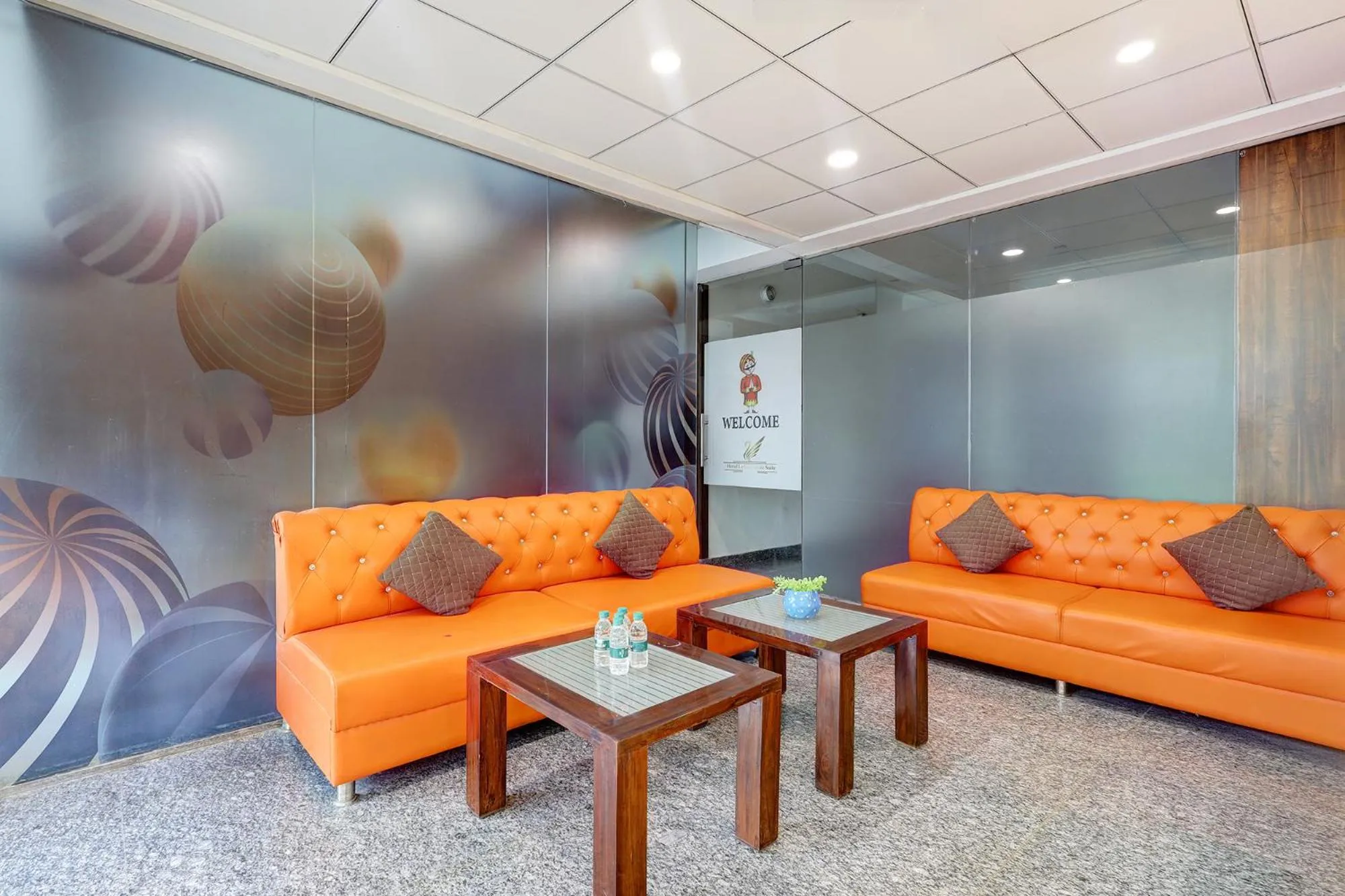 Seating area in FabHotel La Corporate Suite