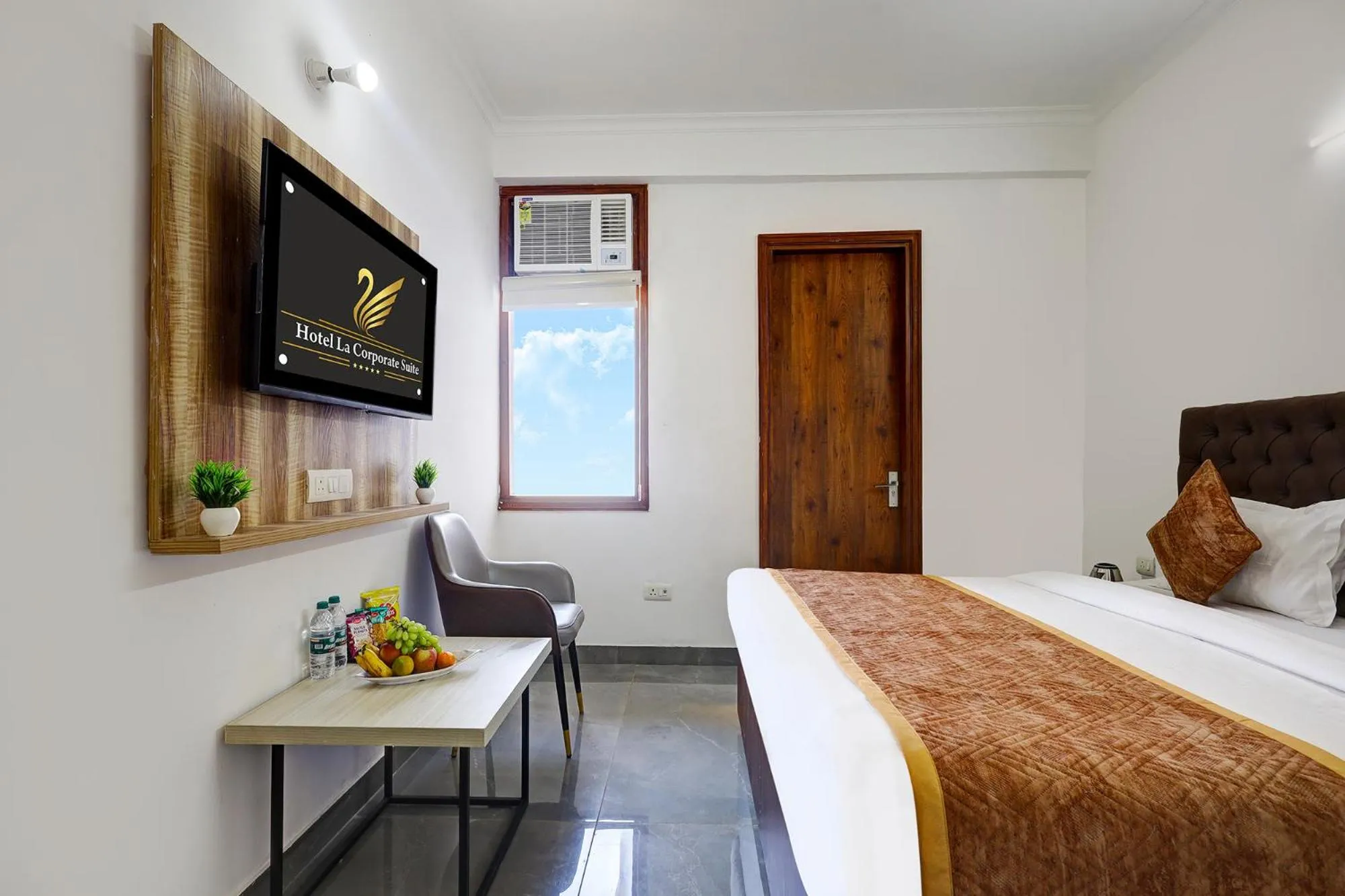 Bed in FabHotel La Corporate Suite