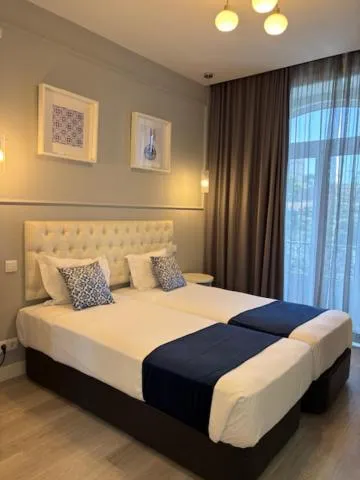 Bed in Lisbon City Inn Hotel by City Hotels