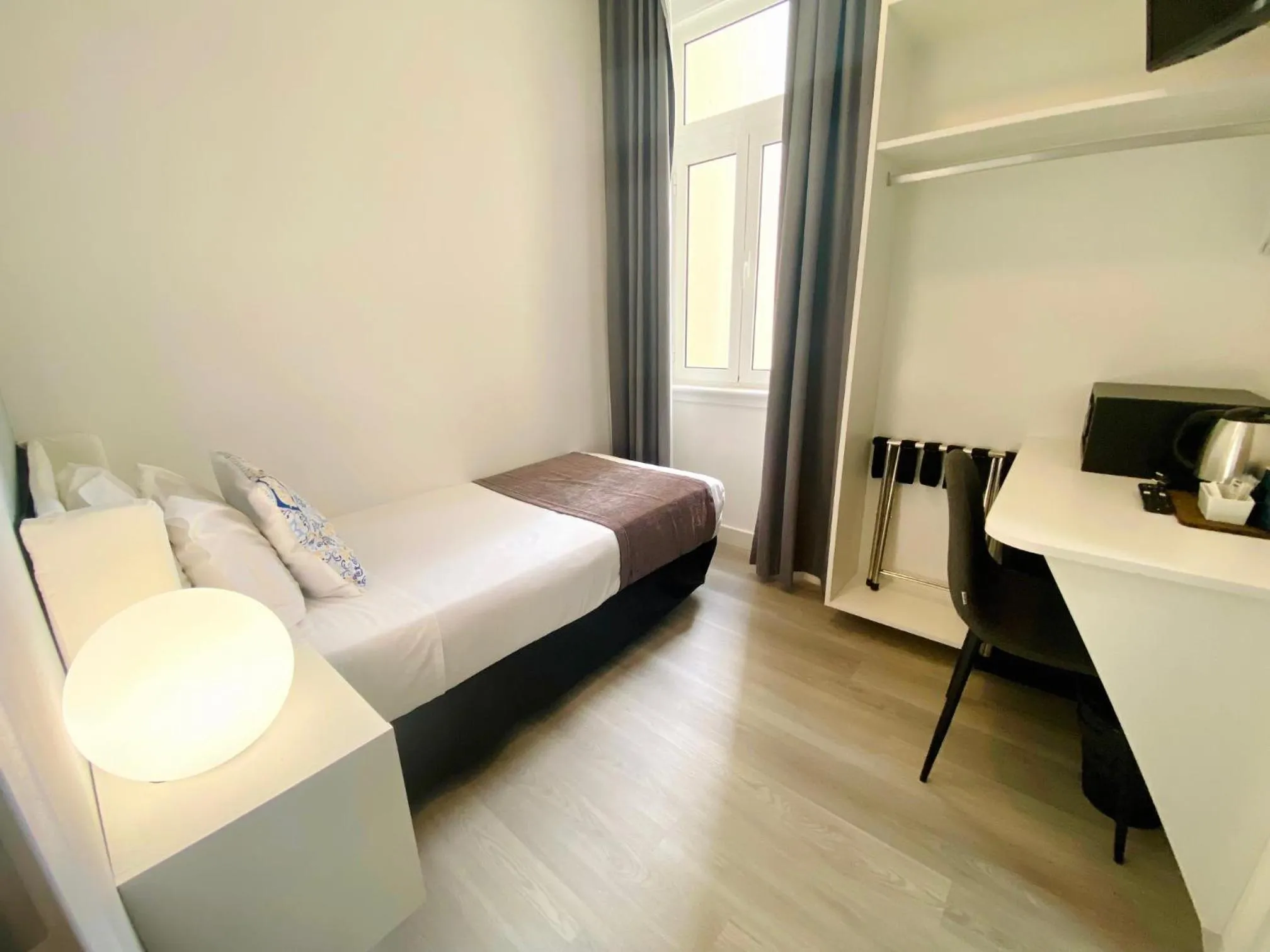 Bed in Lisbon City Inn Hotel by City Hotels
