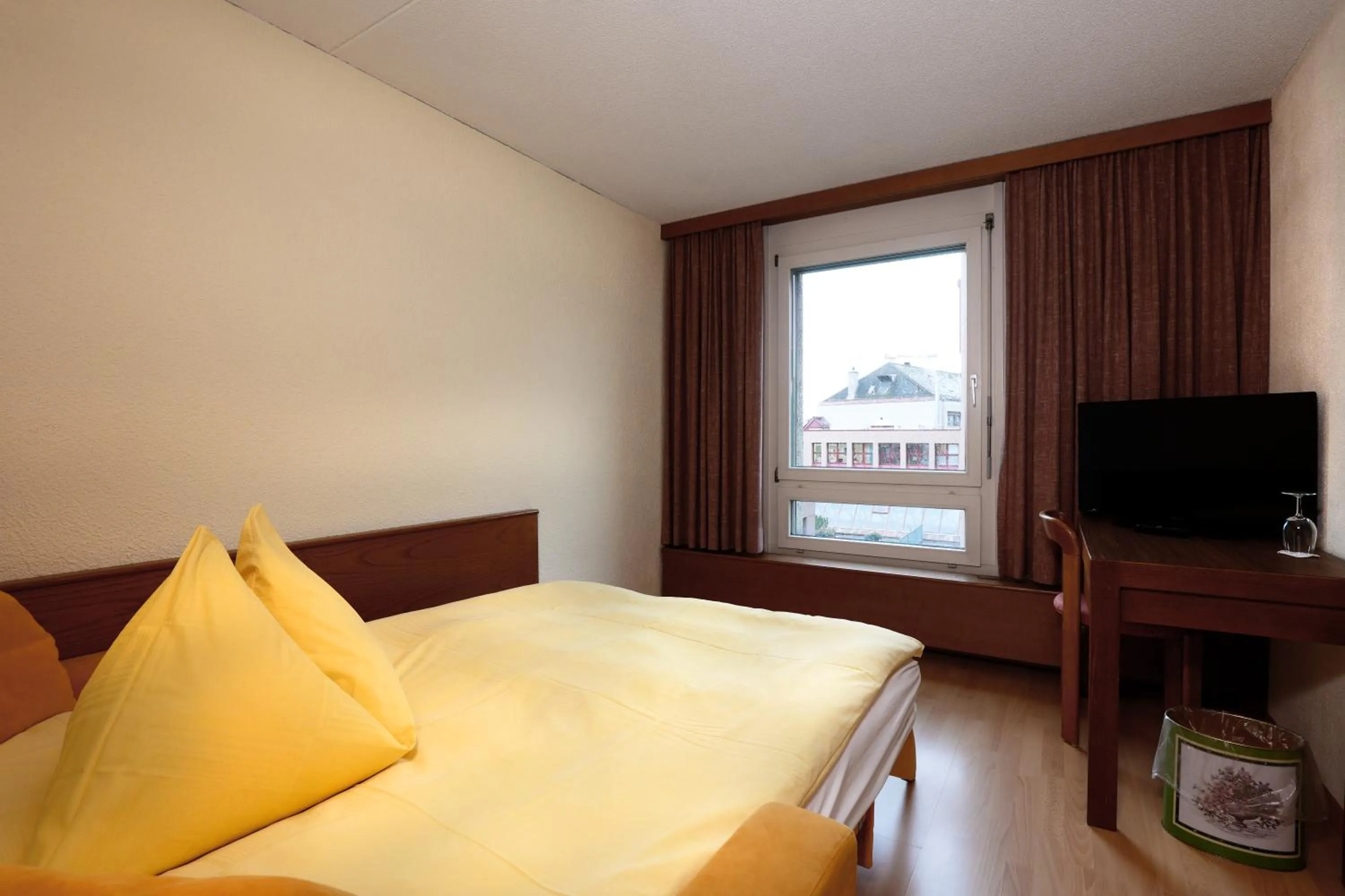 Bed in Hotel Thurgauerhof Self-Check-in