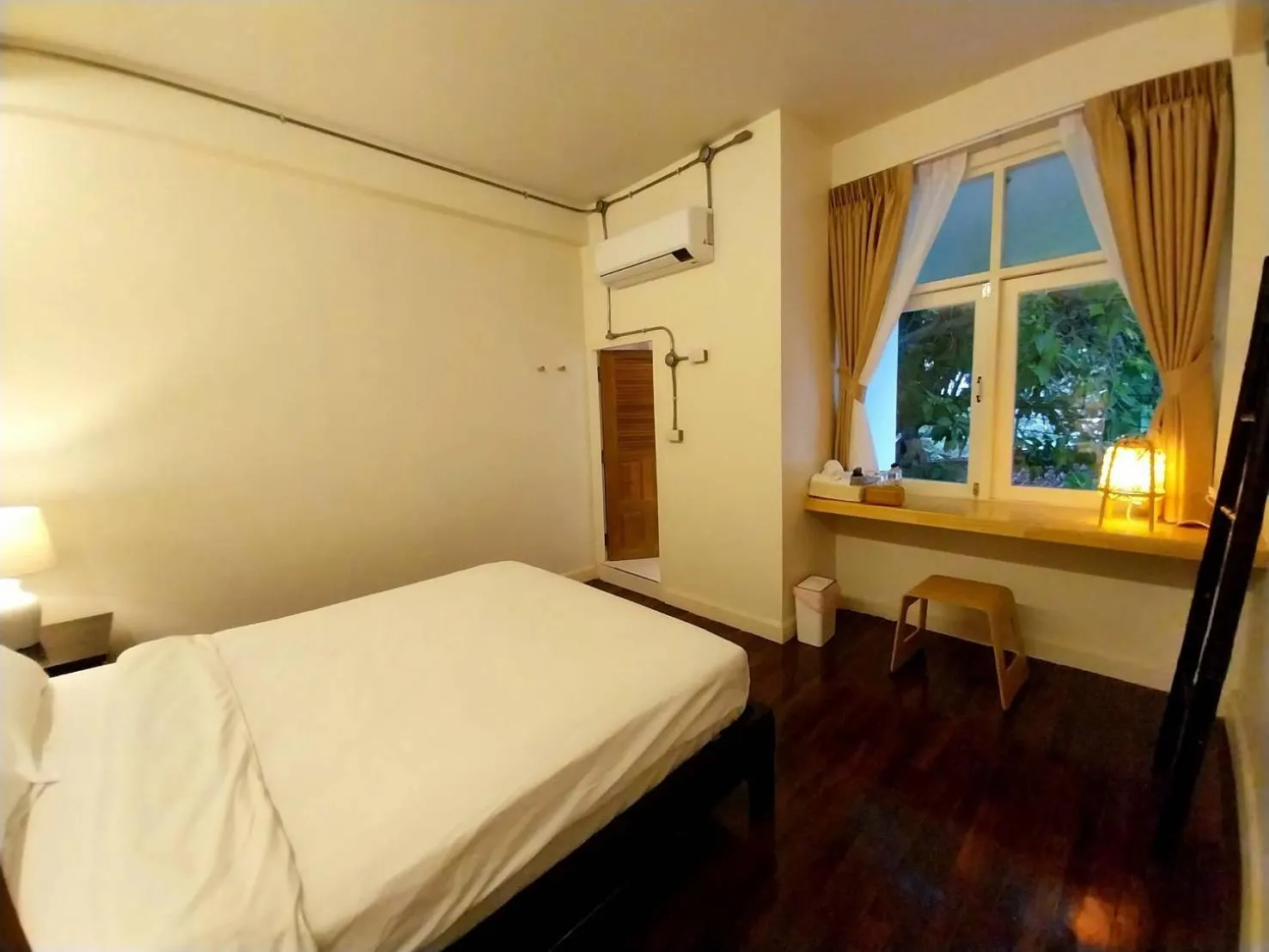 Bed in To The Moon Guesthouse