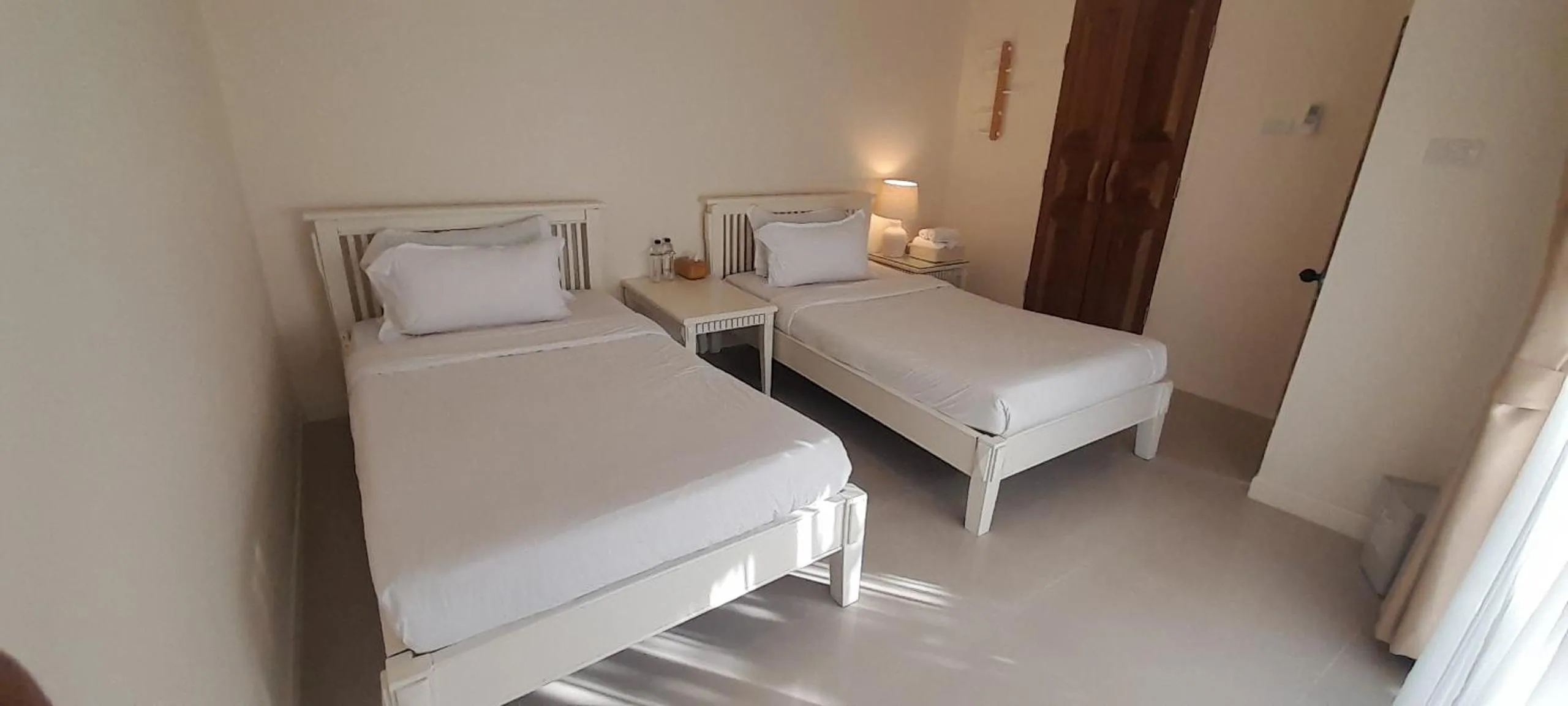 Bed in To The Moon Guesthouse