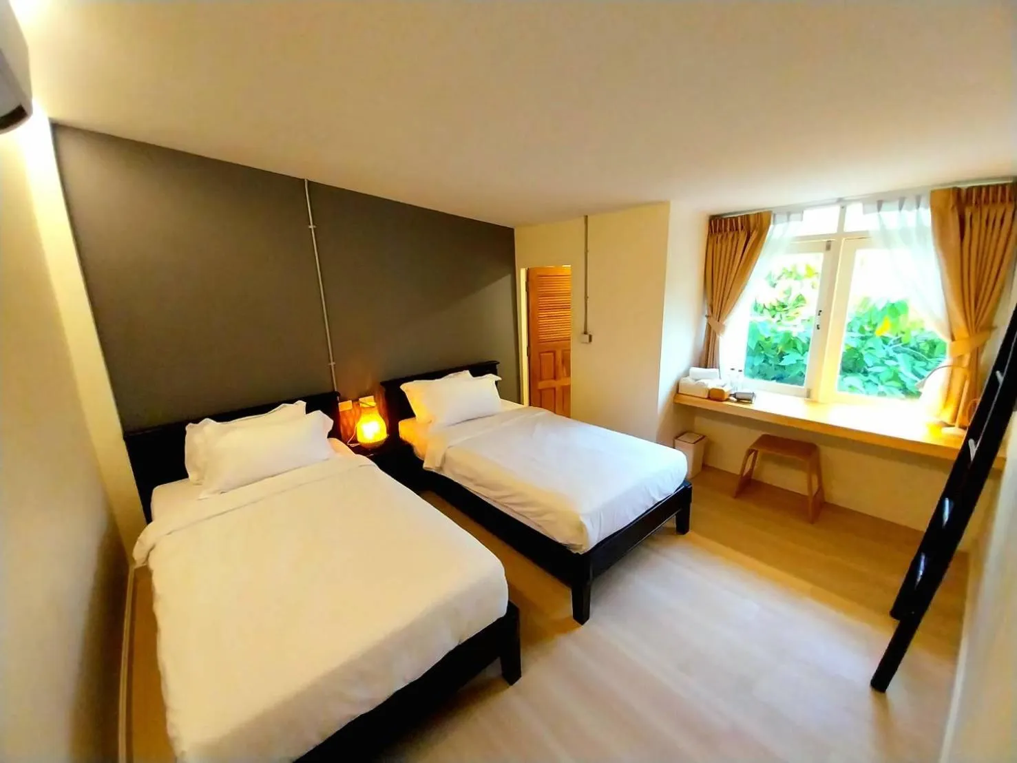 Bed in To The Moon Guesthouse