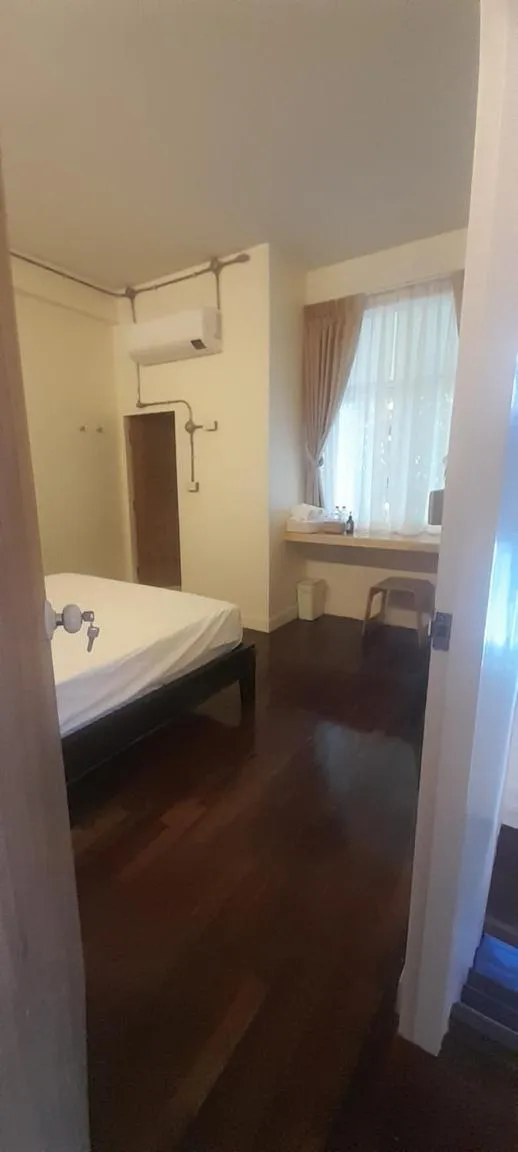 Bed in To The Moon Guesthouse