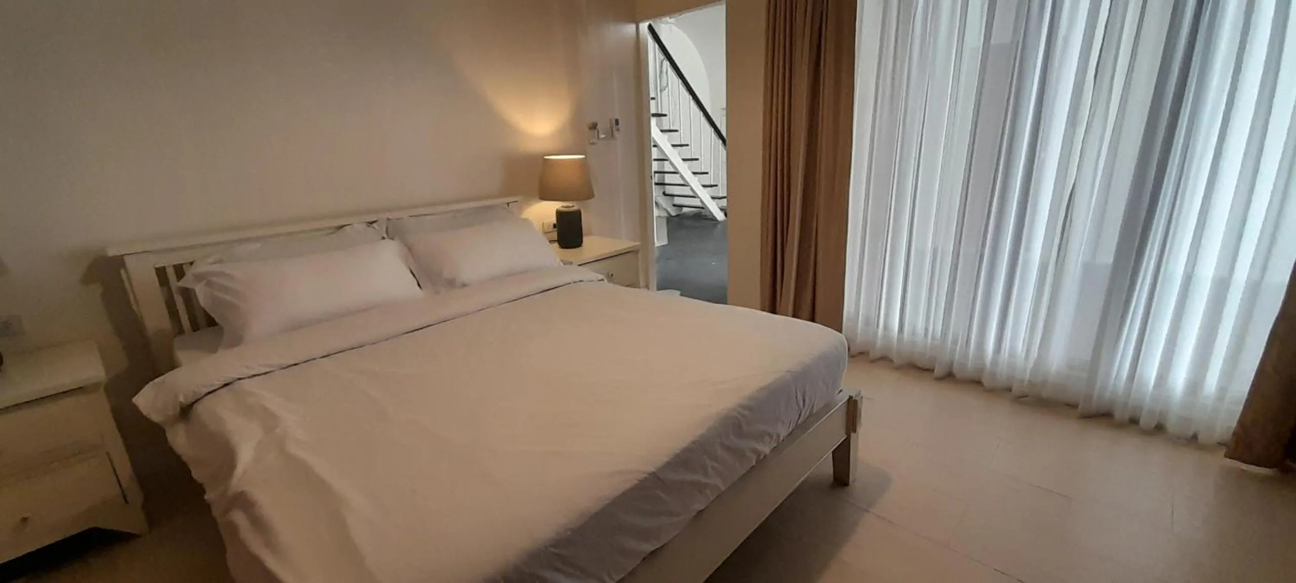 Bed in To The Moon Guesthouse