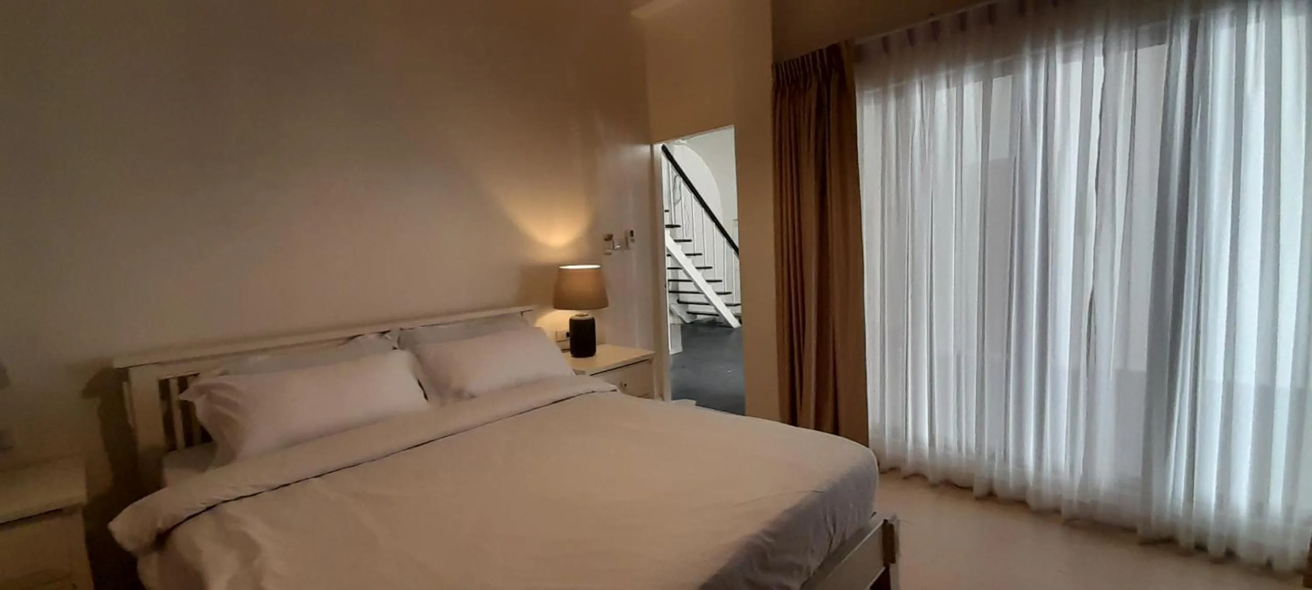 Bed in To The Moon Guesthouse