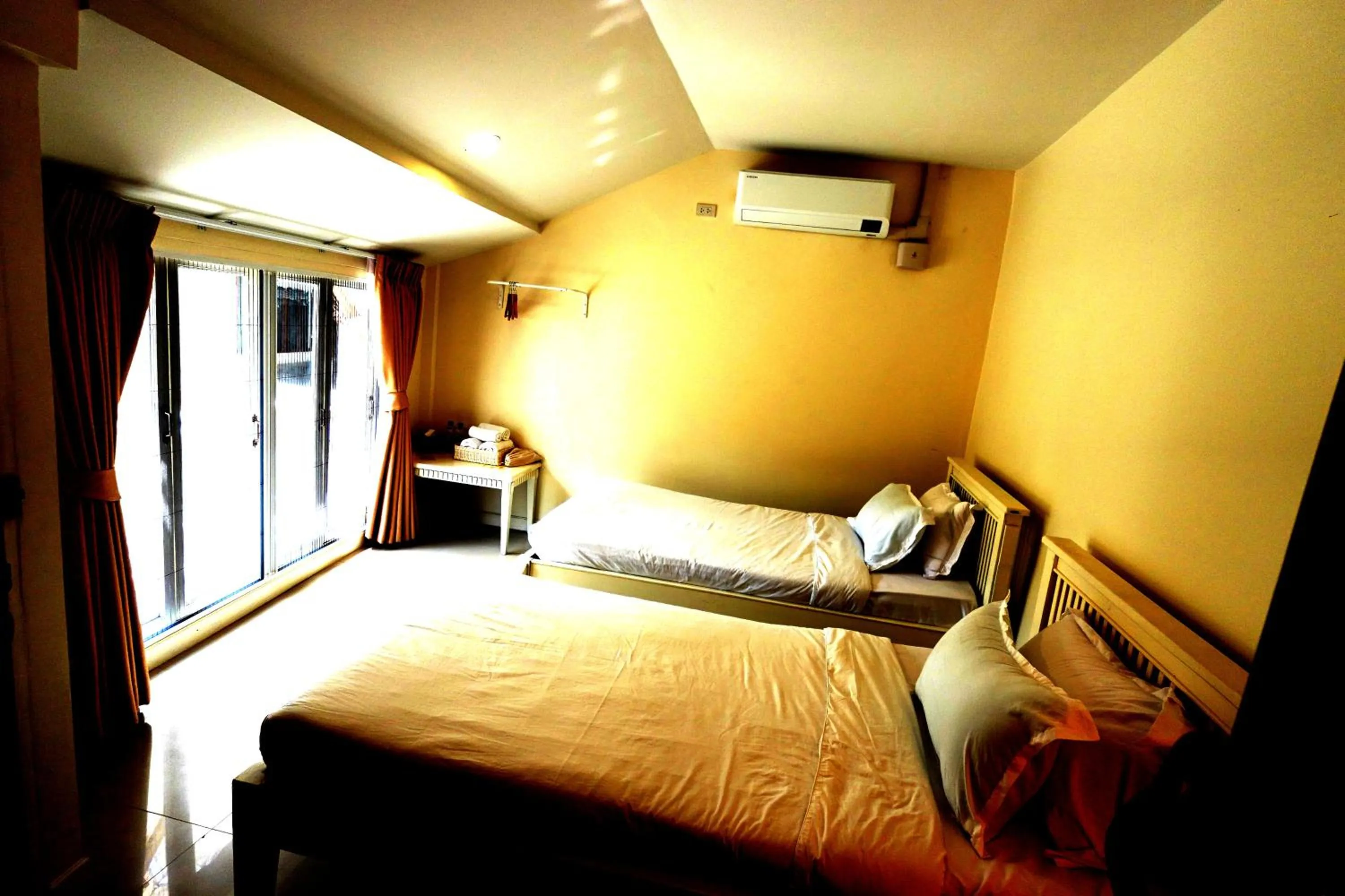 Bed in To The Moon Guesthouse