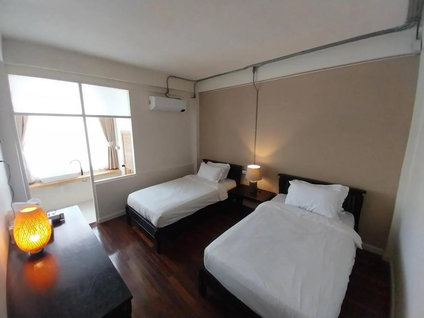 Bed in To The Moon Guesthouse