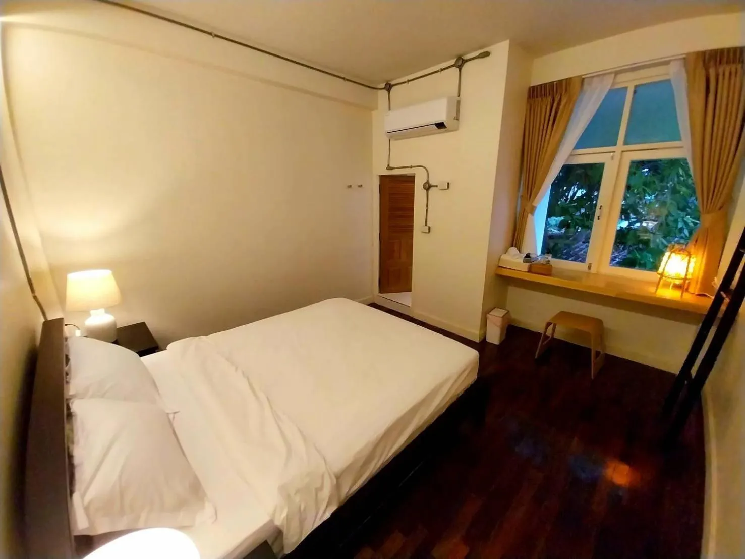 Bed in To The Moon Guesthouse