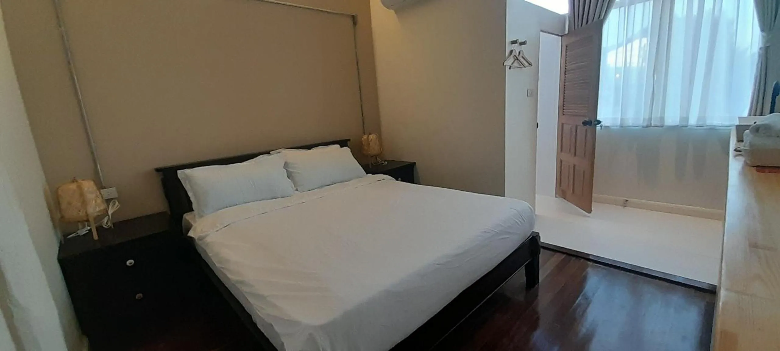 Bed in To The Moon Guesthouse