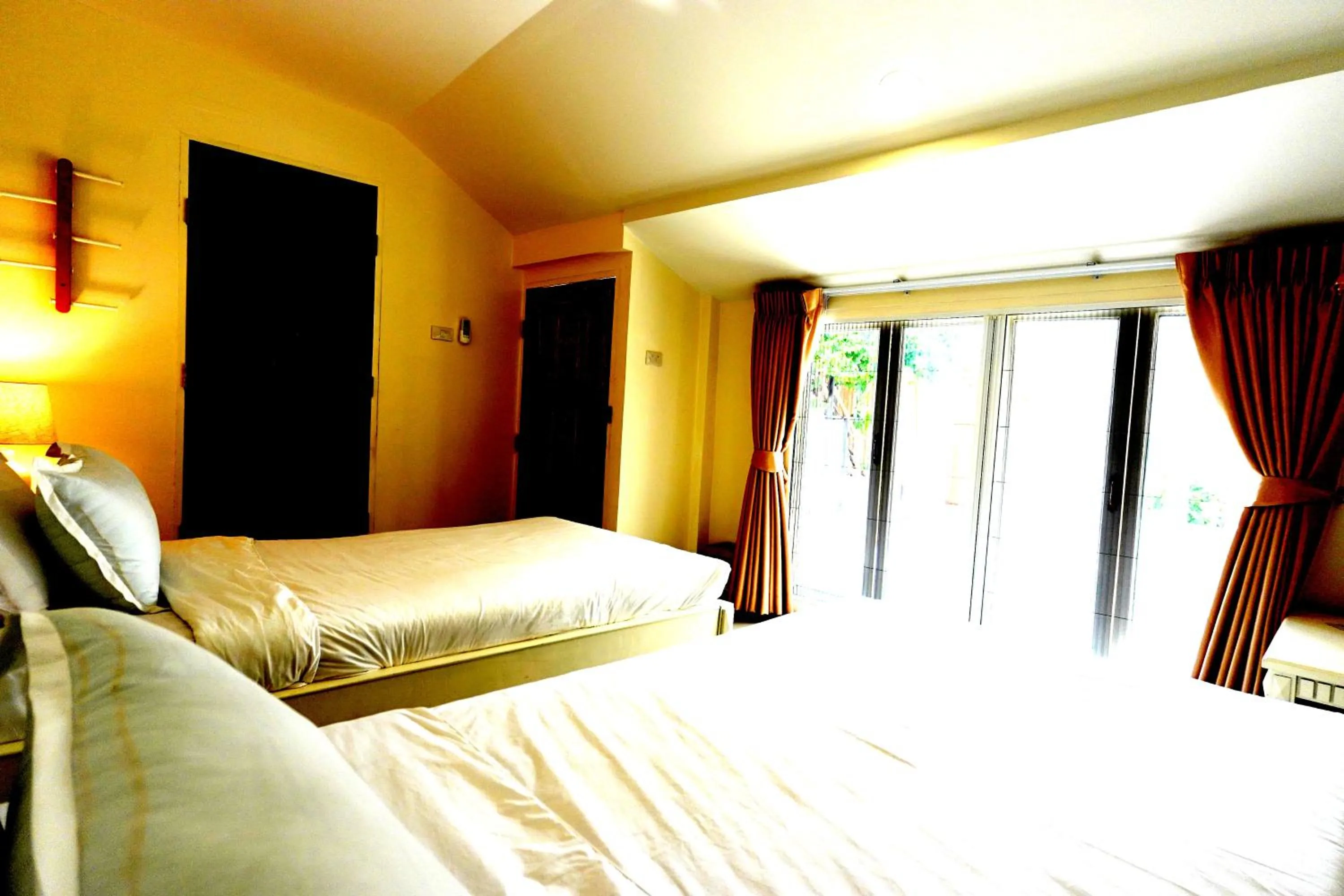 Bed in To The Moon Guesthouse