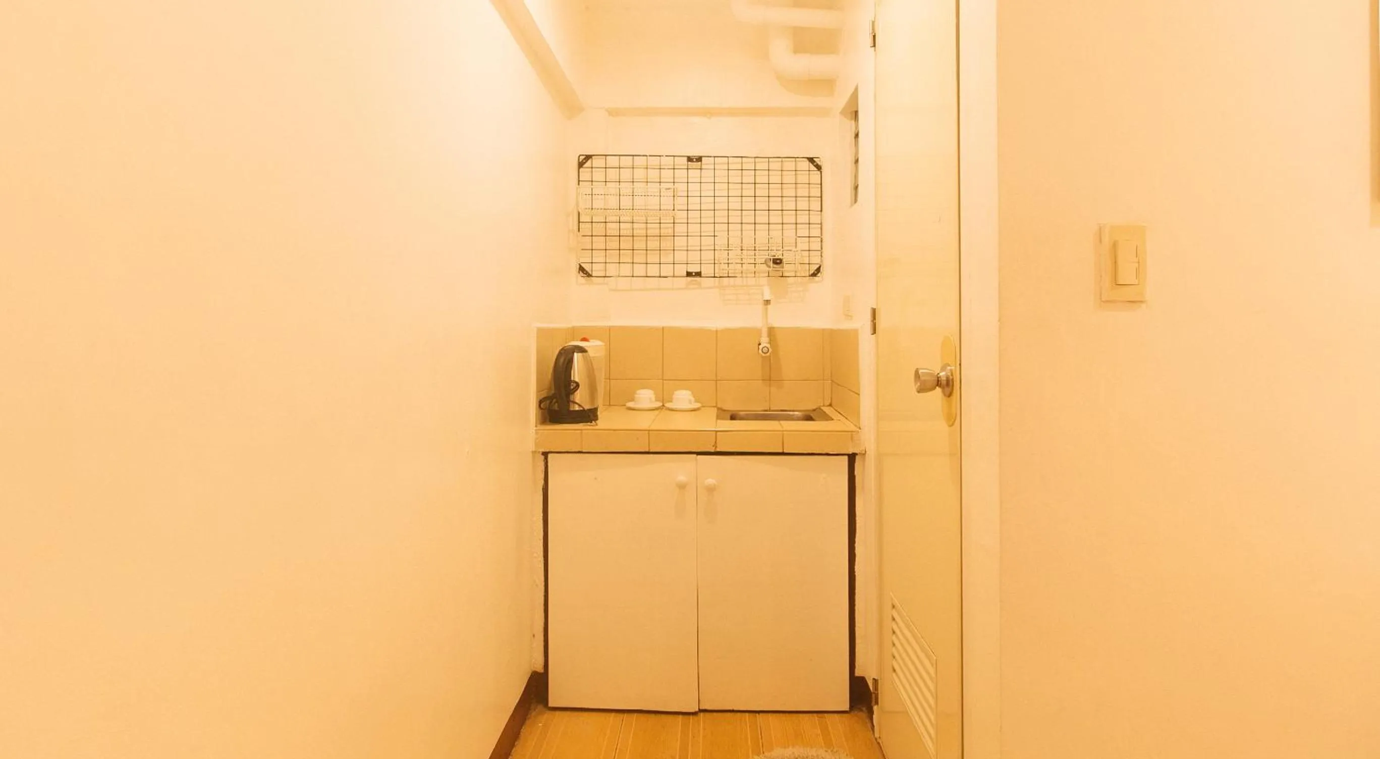 Kitchen or kitchenette in RedDoorz at City Stay Inns Marilao