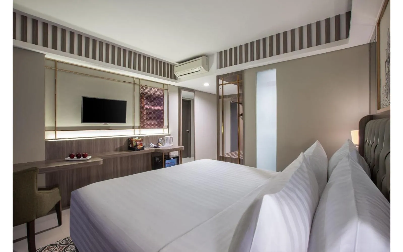 Bed in The Alana Hotel & Conference Center Malioboro Yogyakarta by ASTON