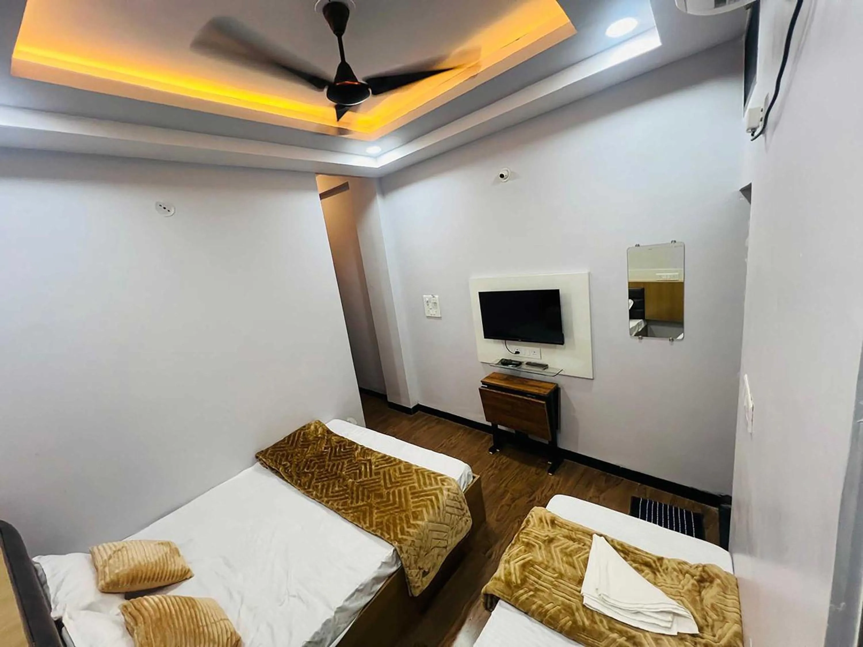 Bed in Hotel Advika Ujjain