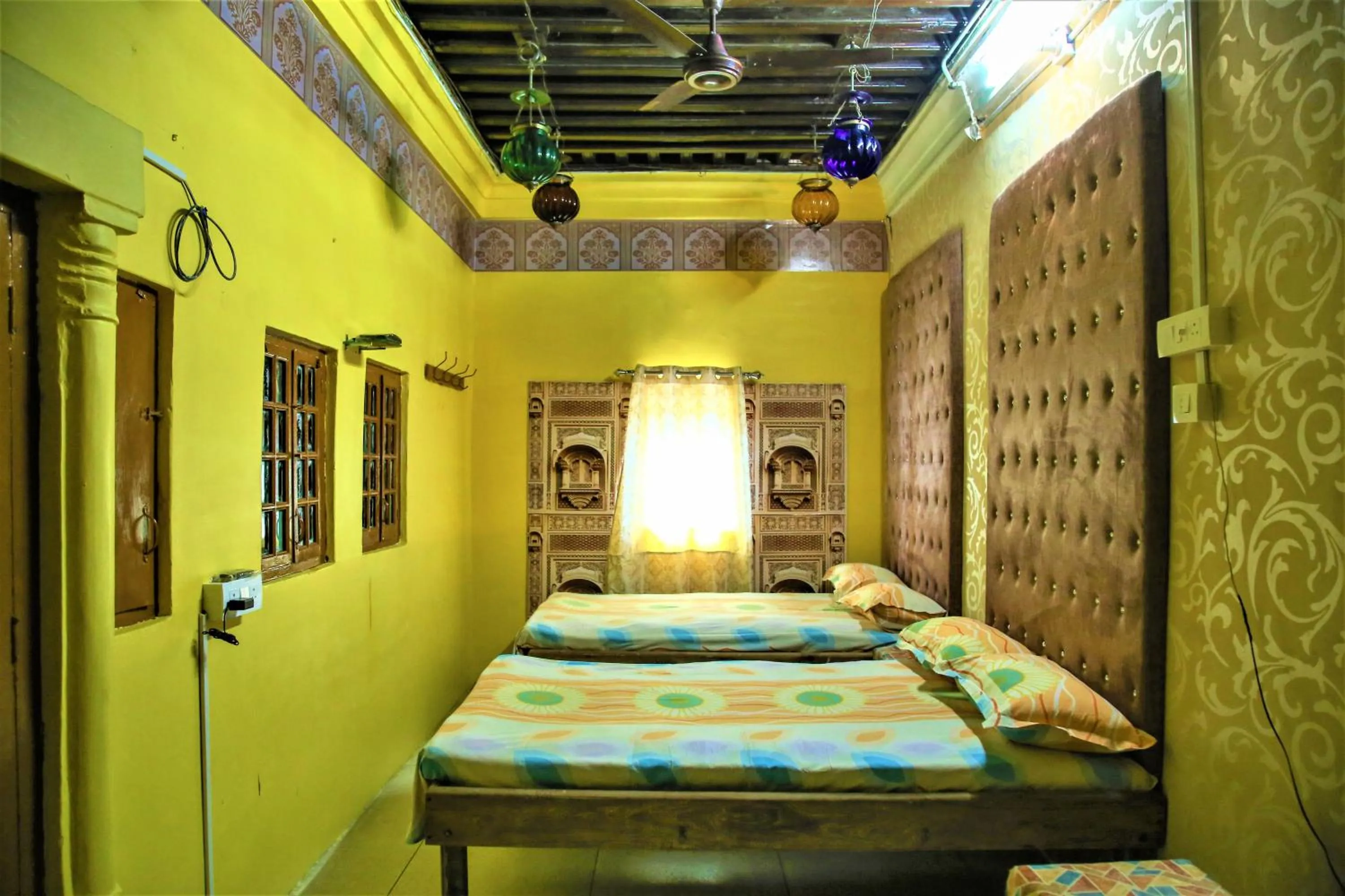 Bed in SAJI SANWRI Heritage Inn Haveli