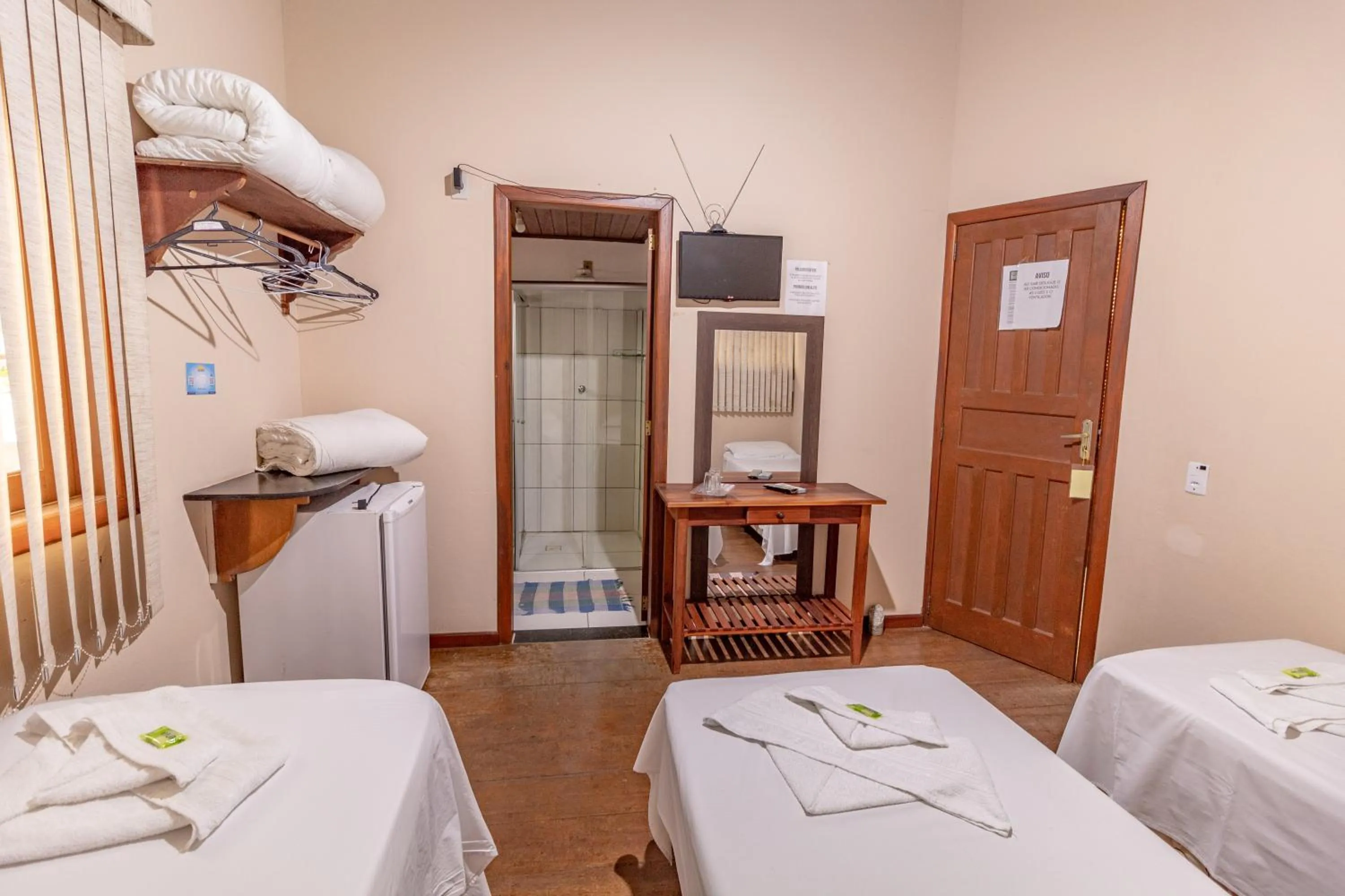 Bed in Pousada Luz do Sol