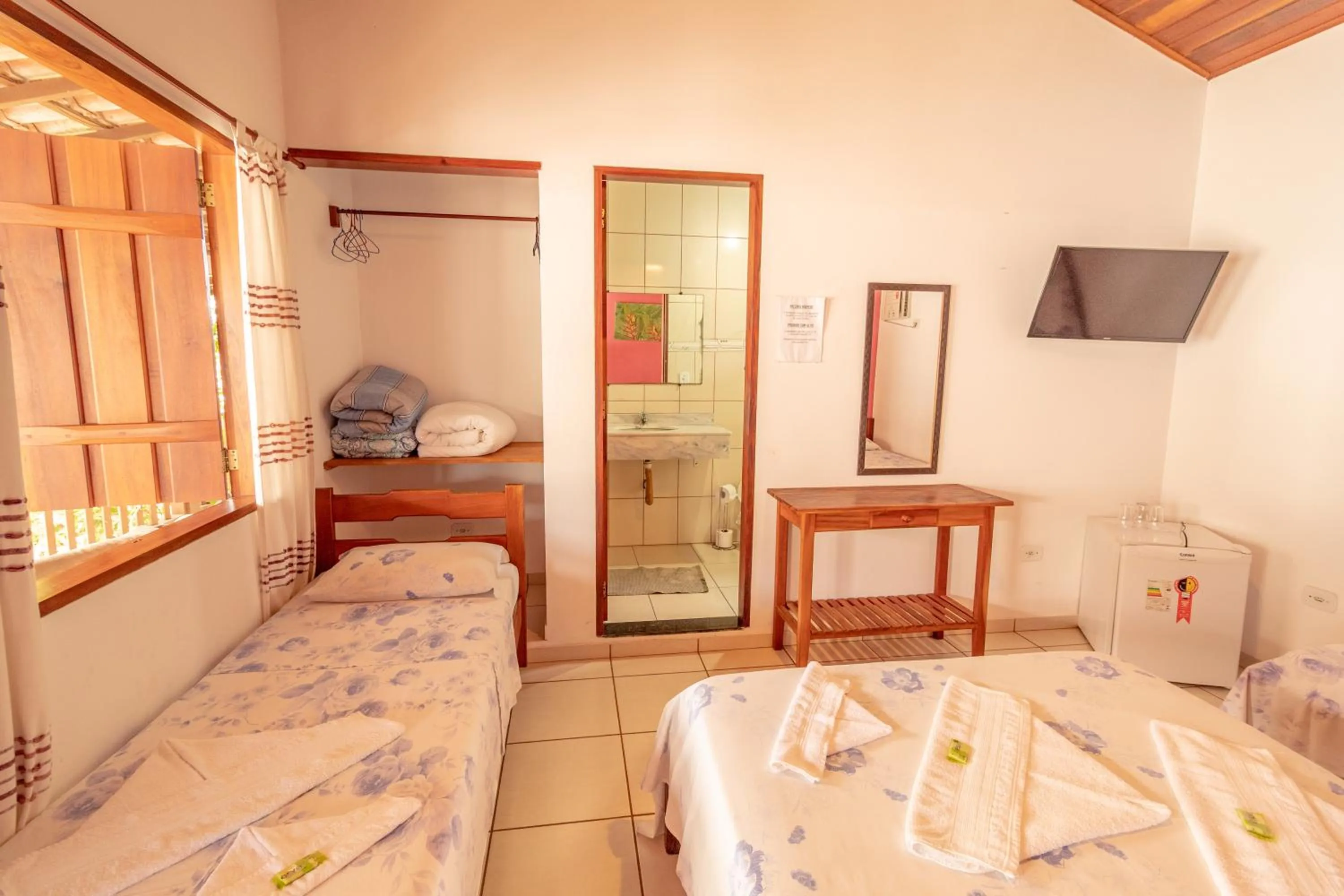 Bed in Pousada Luz do Sol