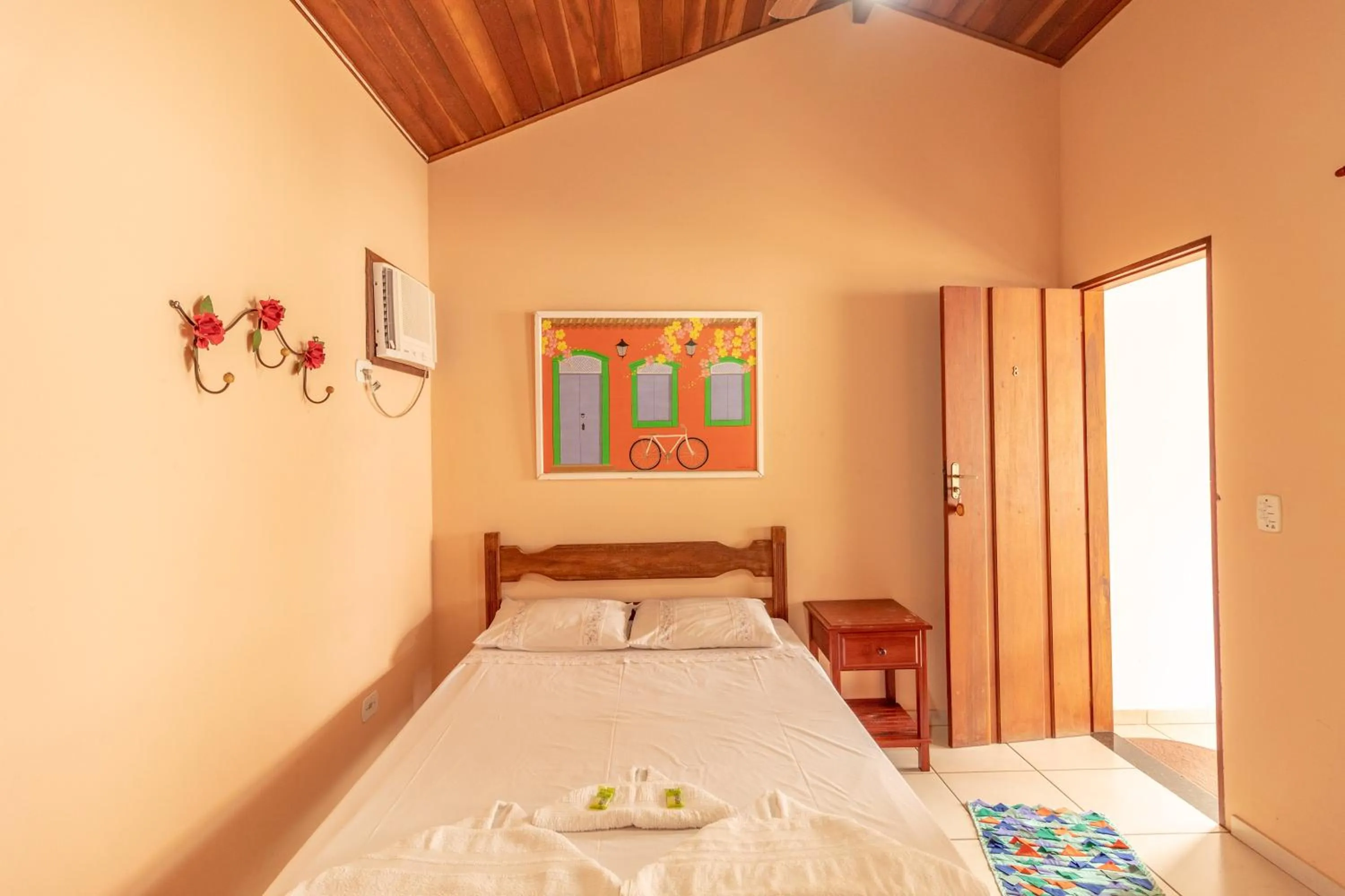 Bed in Pousada Luz do Sol