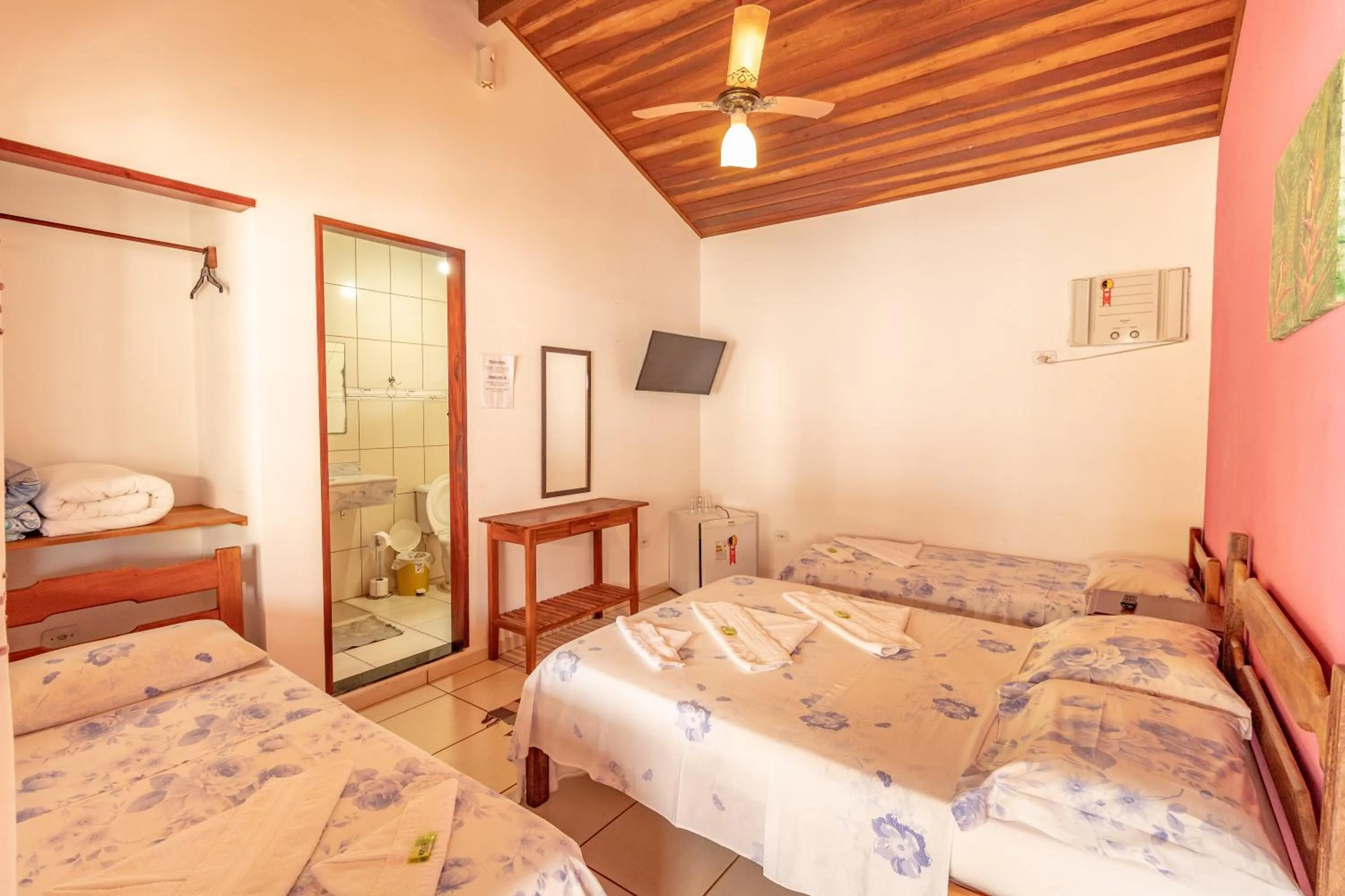 Bed in Pousada Luz do Sol