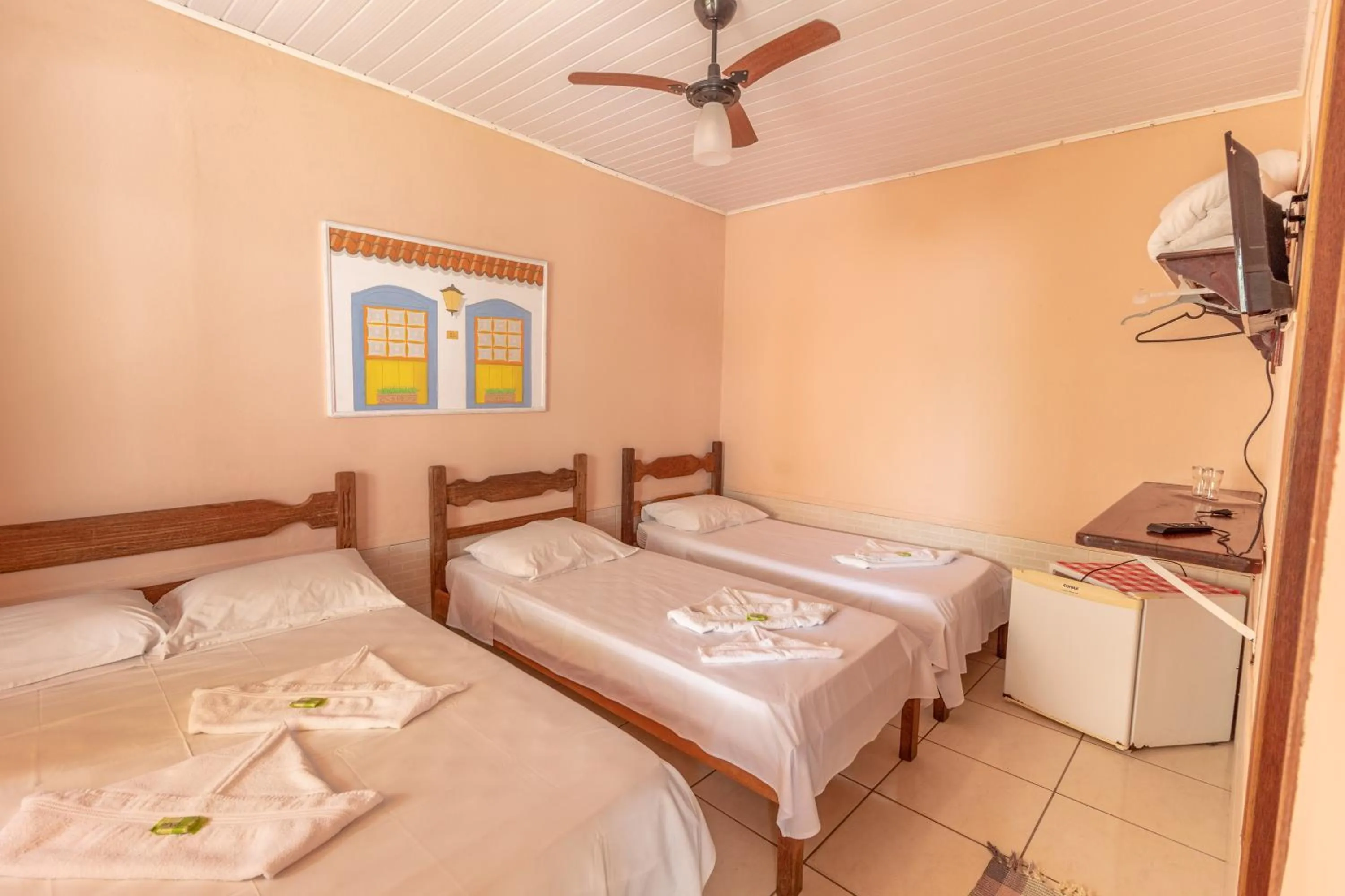 Bed in Pousada Luz do Sol