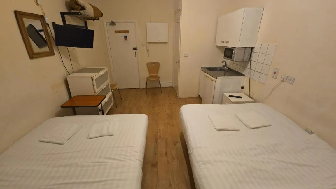 Photo of the whole room, Bed in Anwar House